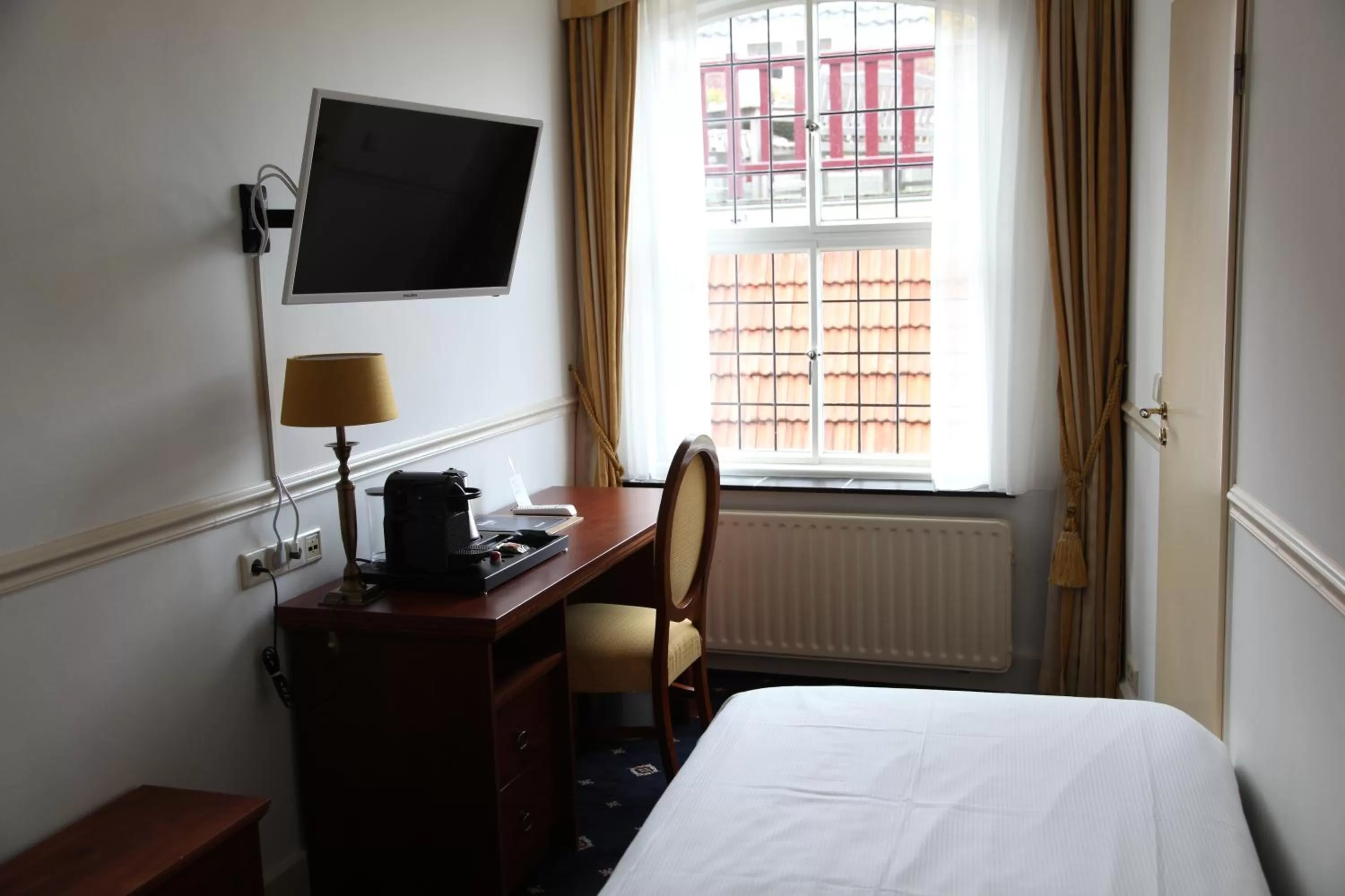 Bed in Villa-Hotel De Kroon Gennep