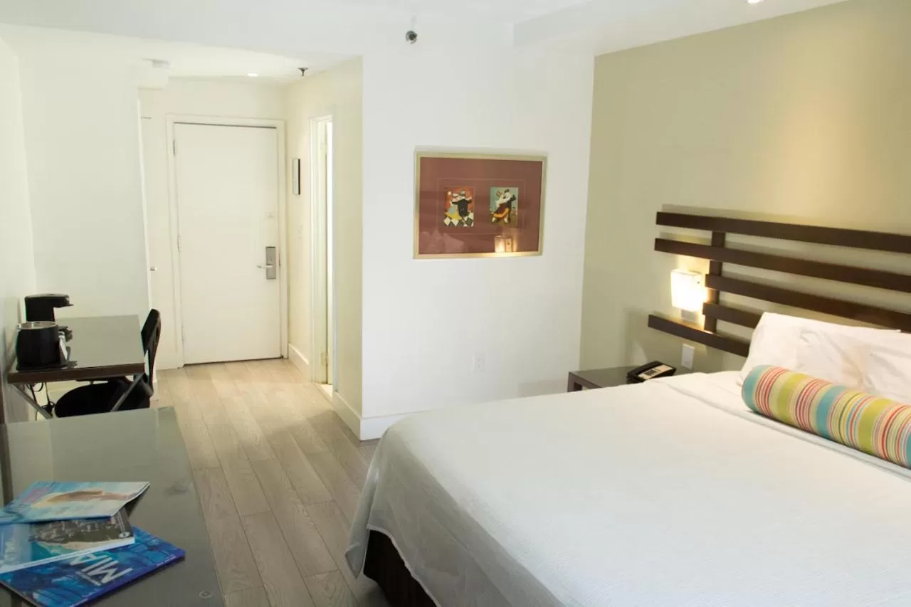 Bed in Dorchester Hotel & Suites