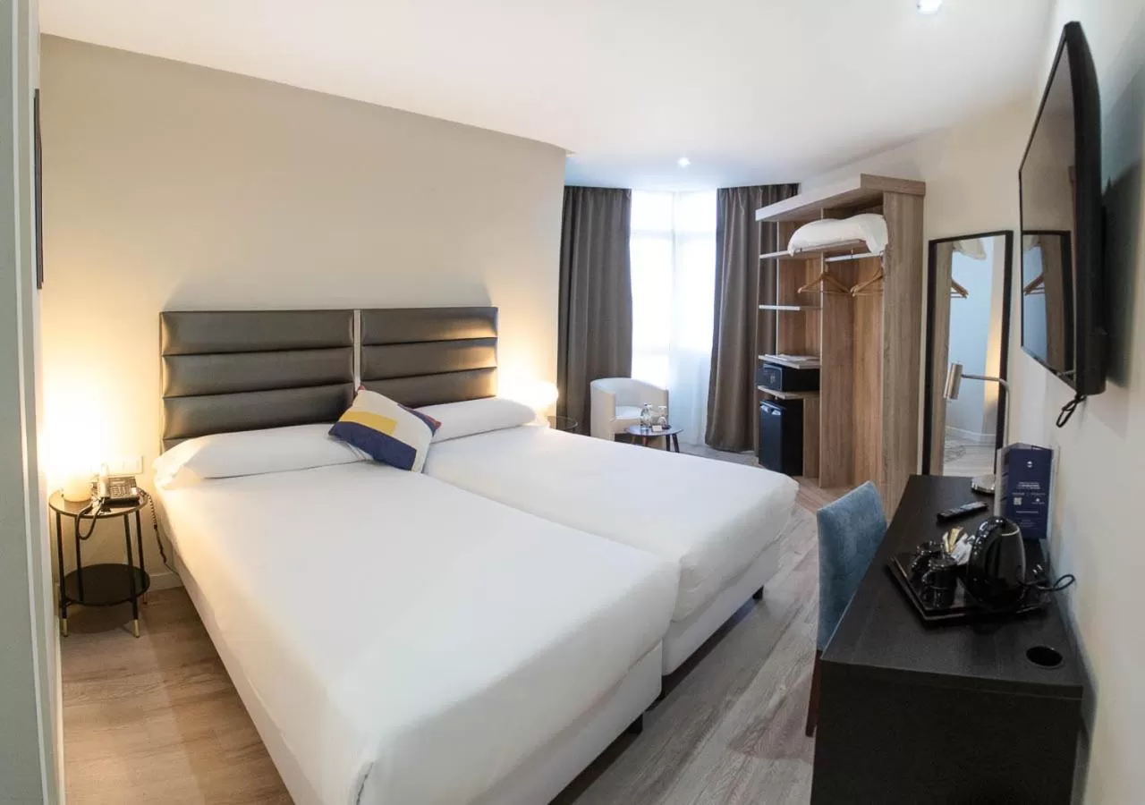 Bed in Hotel Pasarela