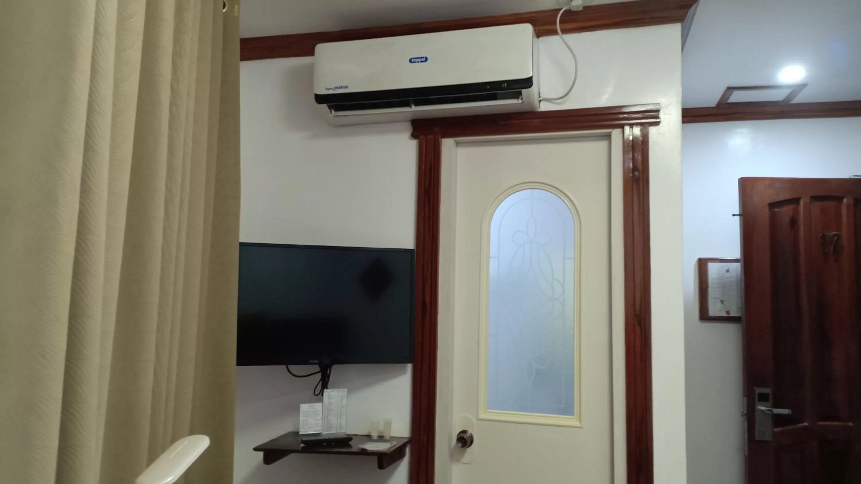 TV and multimedia, TV/Entertainment Center in CLN Boutique Hotel