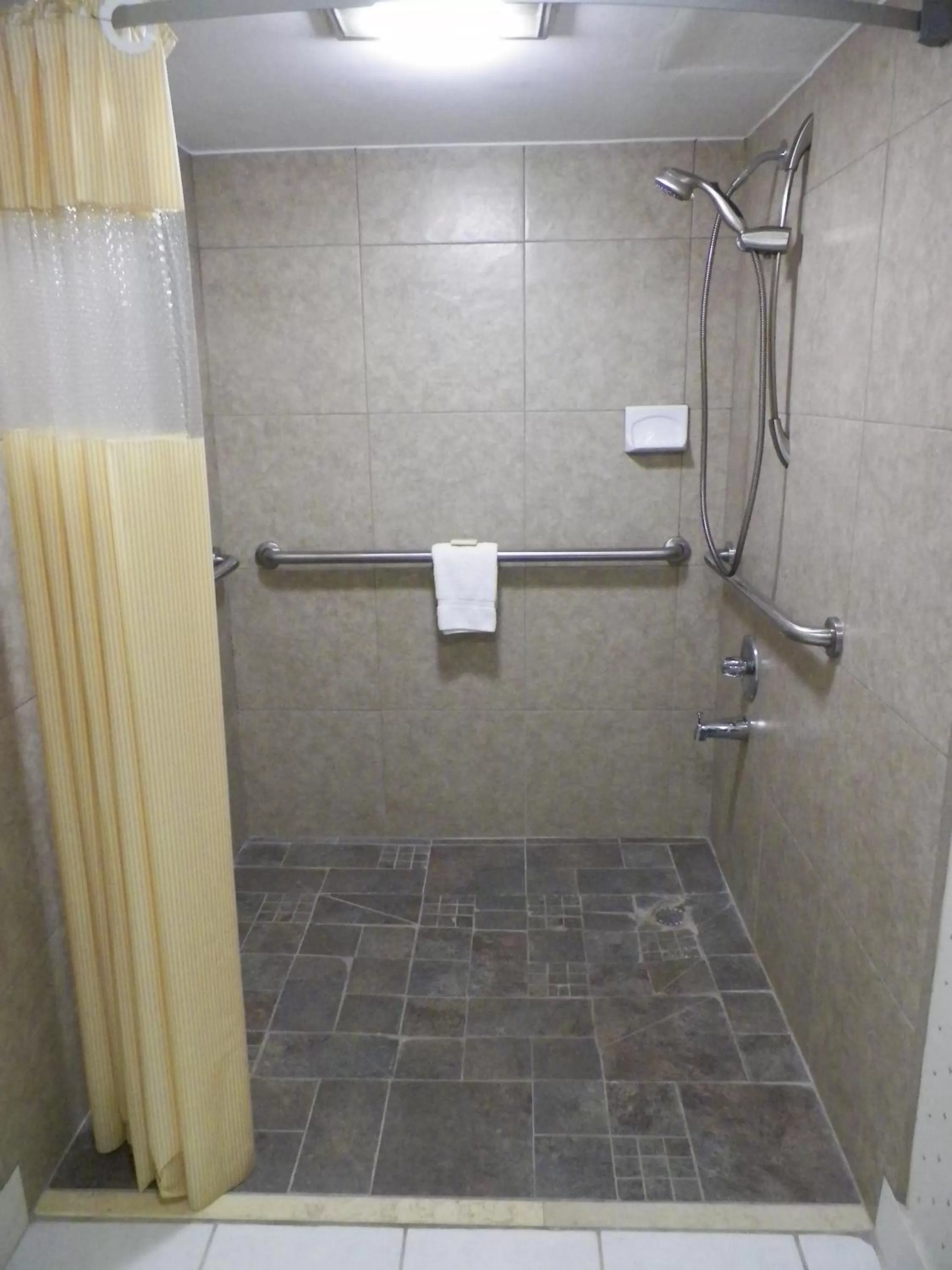 Bathroom in Days Inn by Wyndham Raleigh Midtown