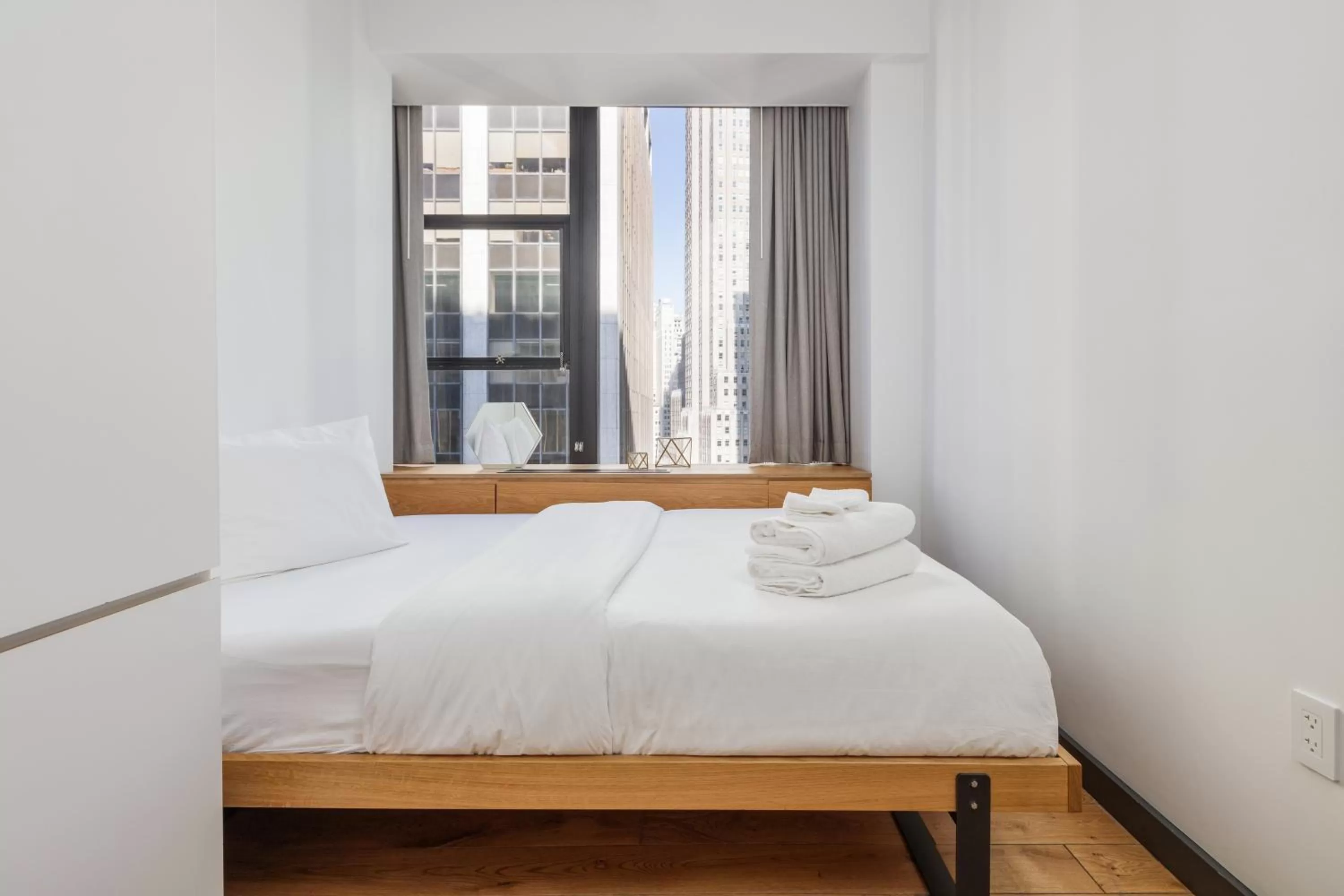 Bed in Placemakr Wall Street