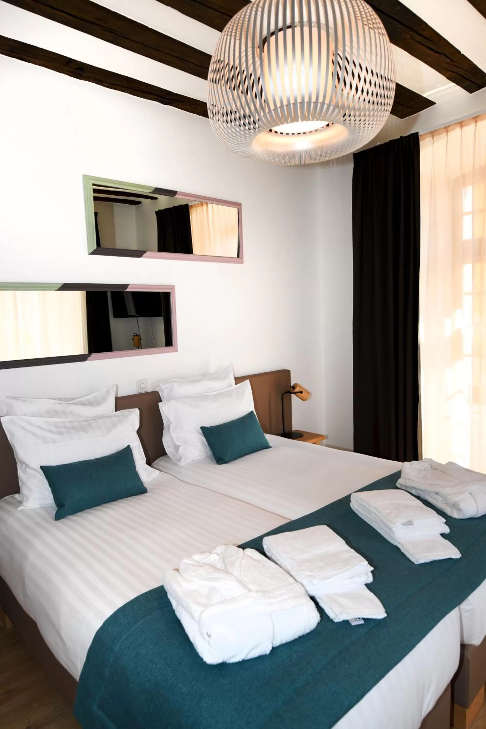 Bed in Hôtel de Ville d'Ollon