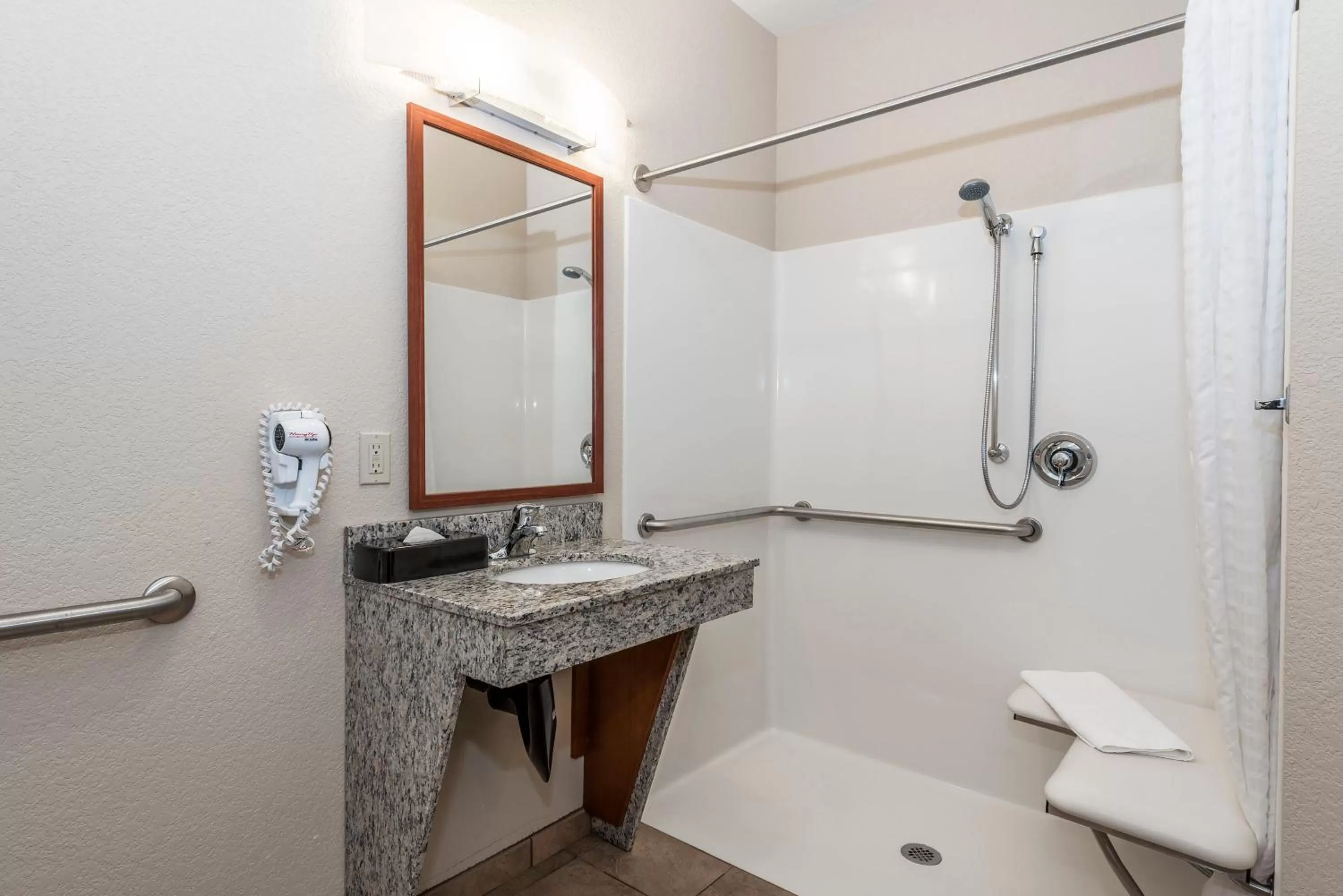 Bathroom in Candlewood Suites Burlington by IHG