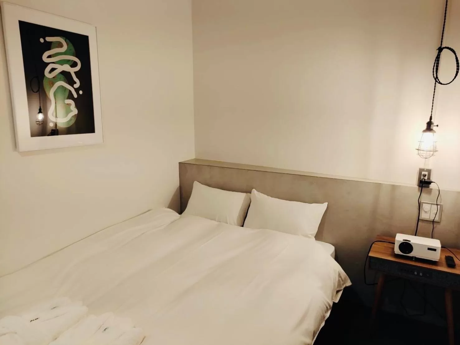 Bed in BENJAMIN HOTEL KANAZAWA