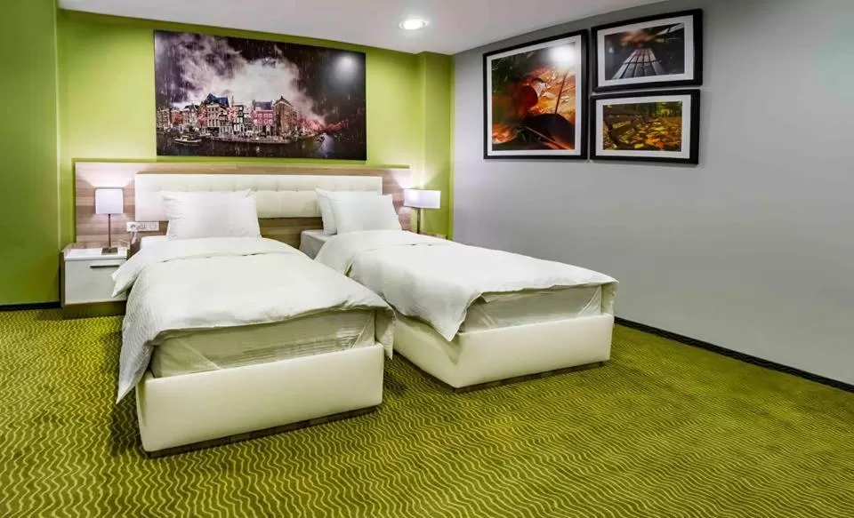 Bed in Central Hotel, Fitness and Spa