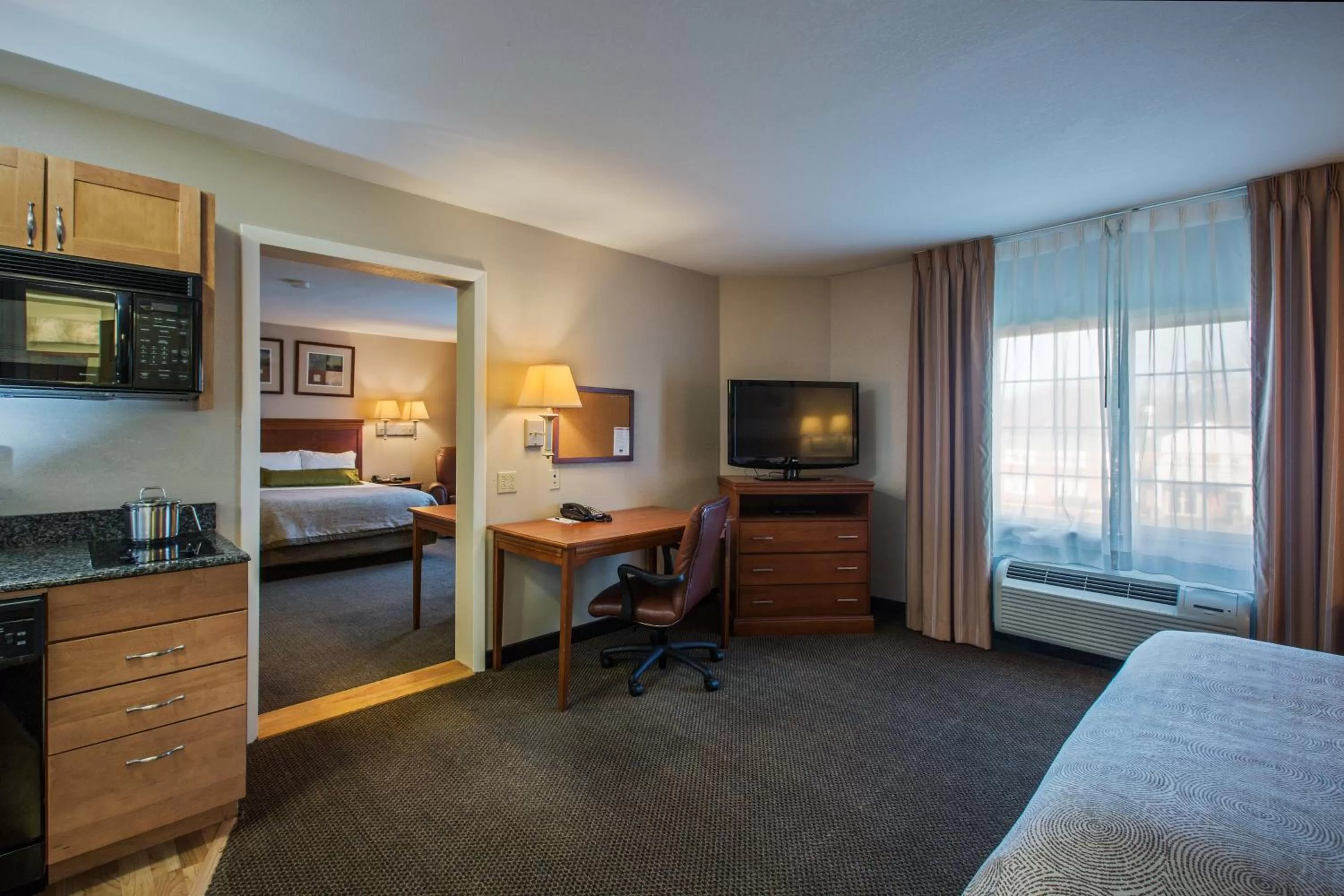 Photo of the whole room, Bed in Candlewood Suites Windsor Locks by IHG