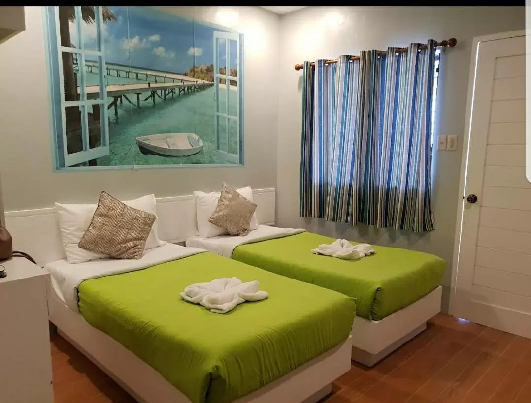 Bed in Tropical Fun Ta Sea Rentals
