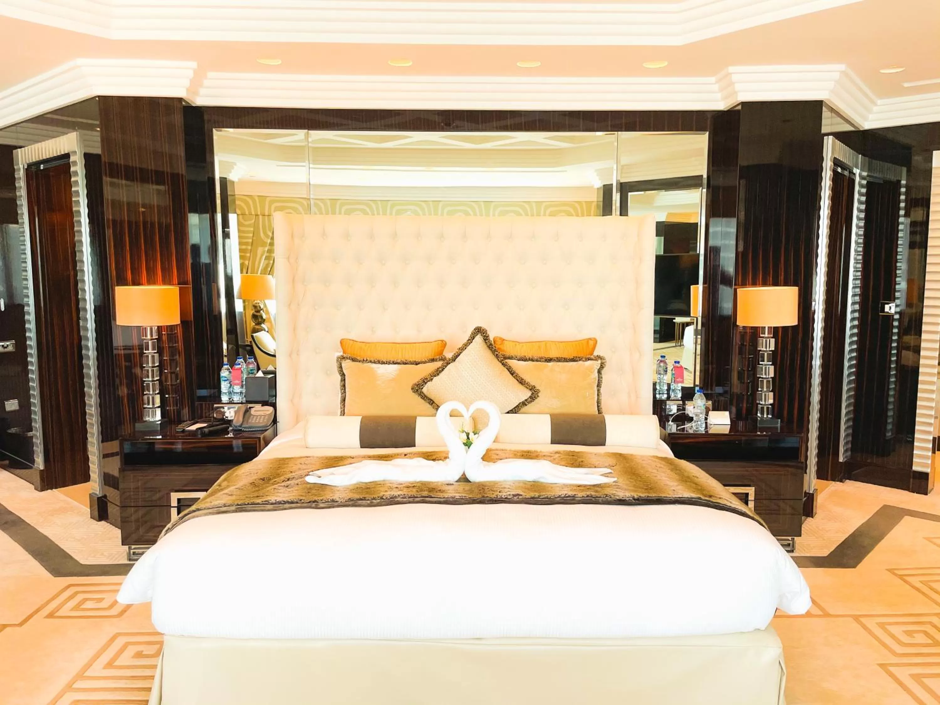 Bed in Mövenpick Grand Al Bustan