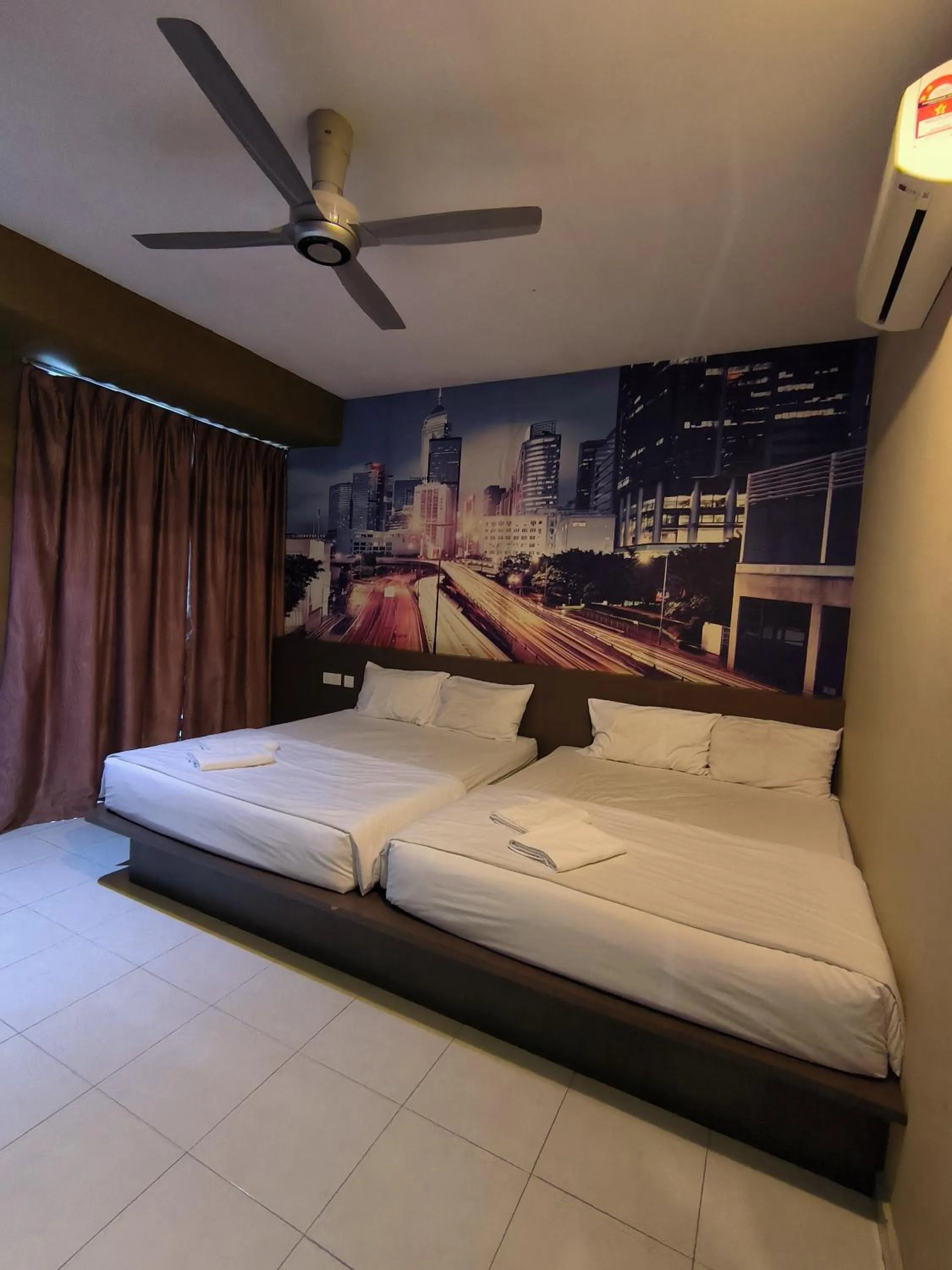 Bed in GOLDEN GUEST HOUSE KUANTAN