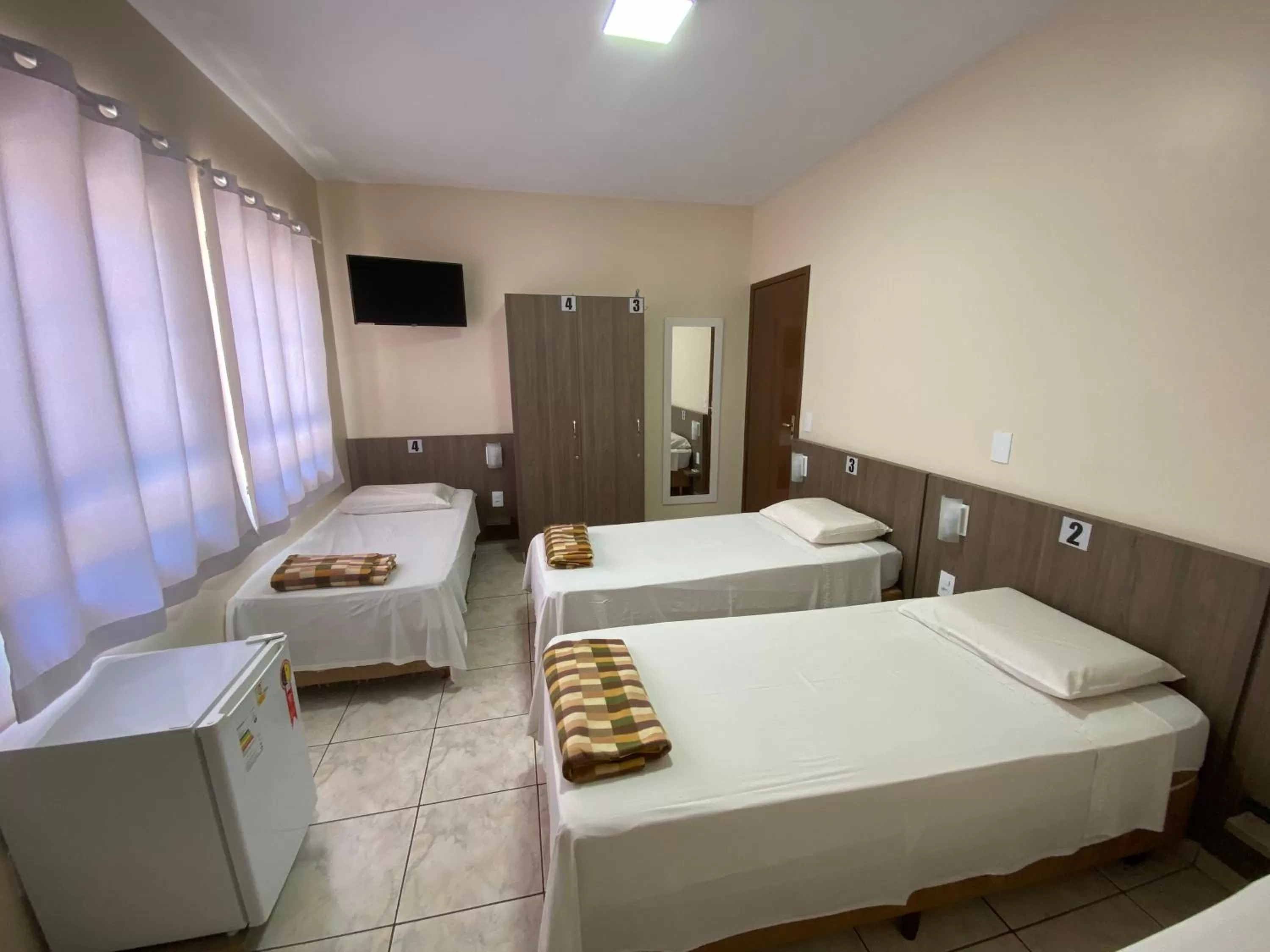 Bed in Pousada El Shaddai