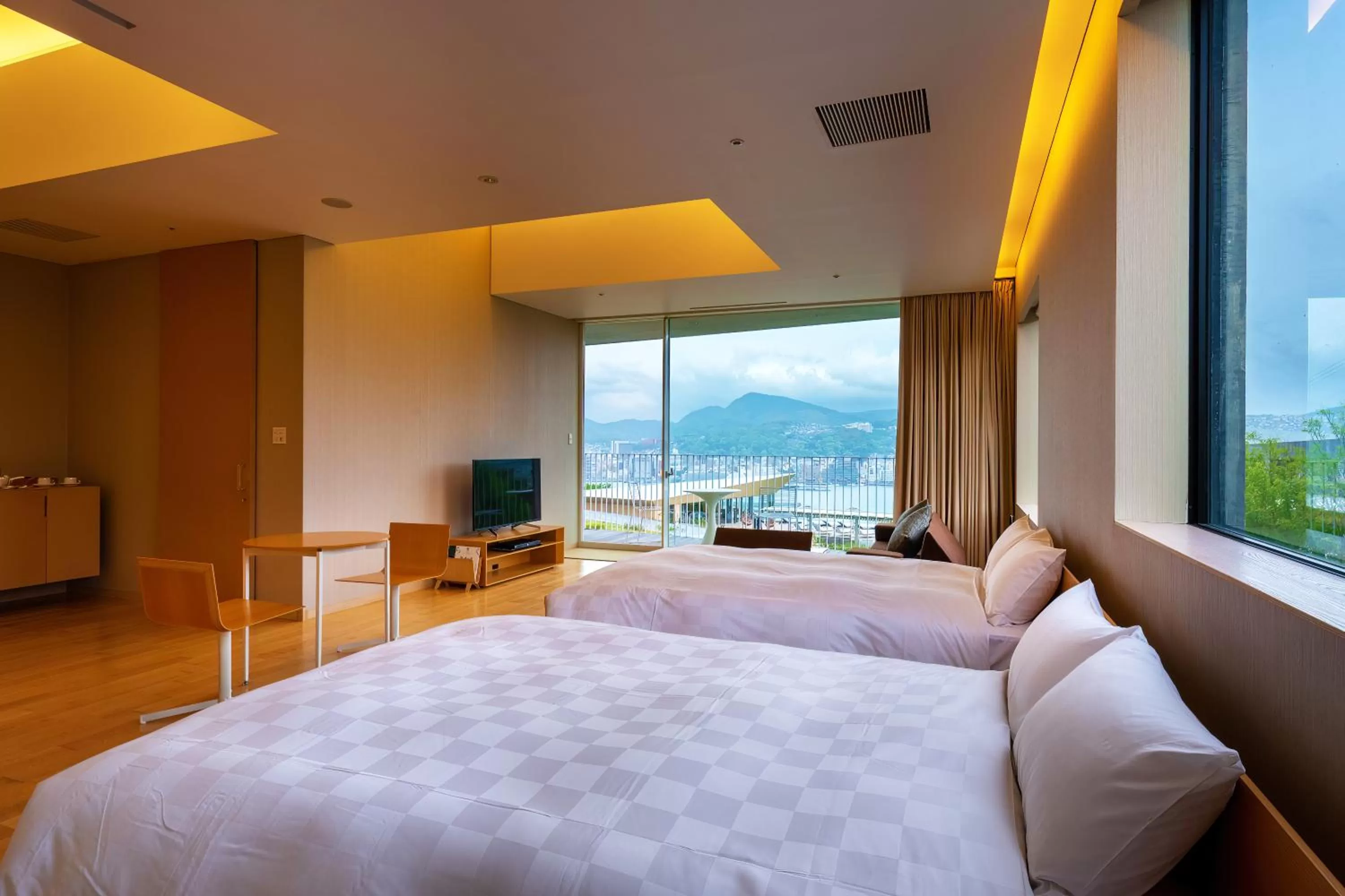 Bed in Garden Terrace Nagasaki Hotels & Resorts