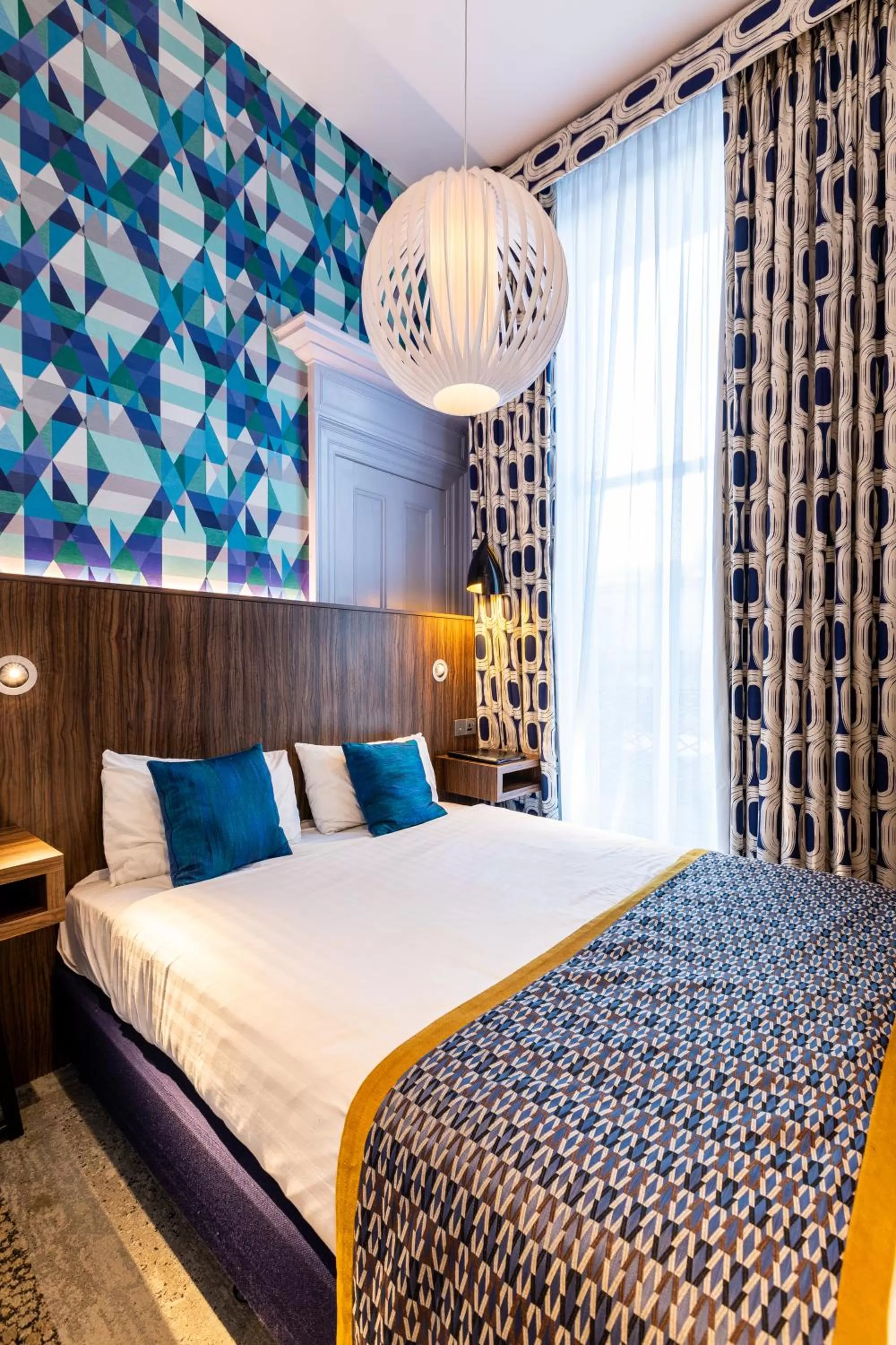 Bed in Cairn Hotel & Apartments