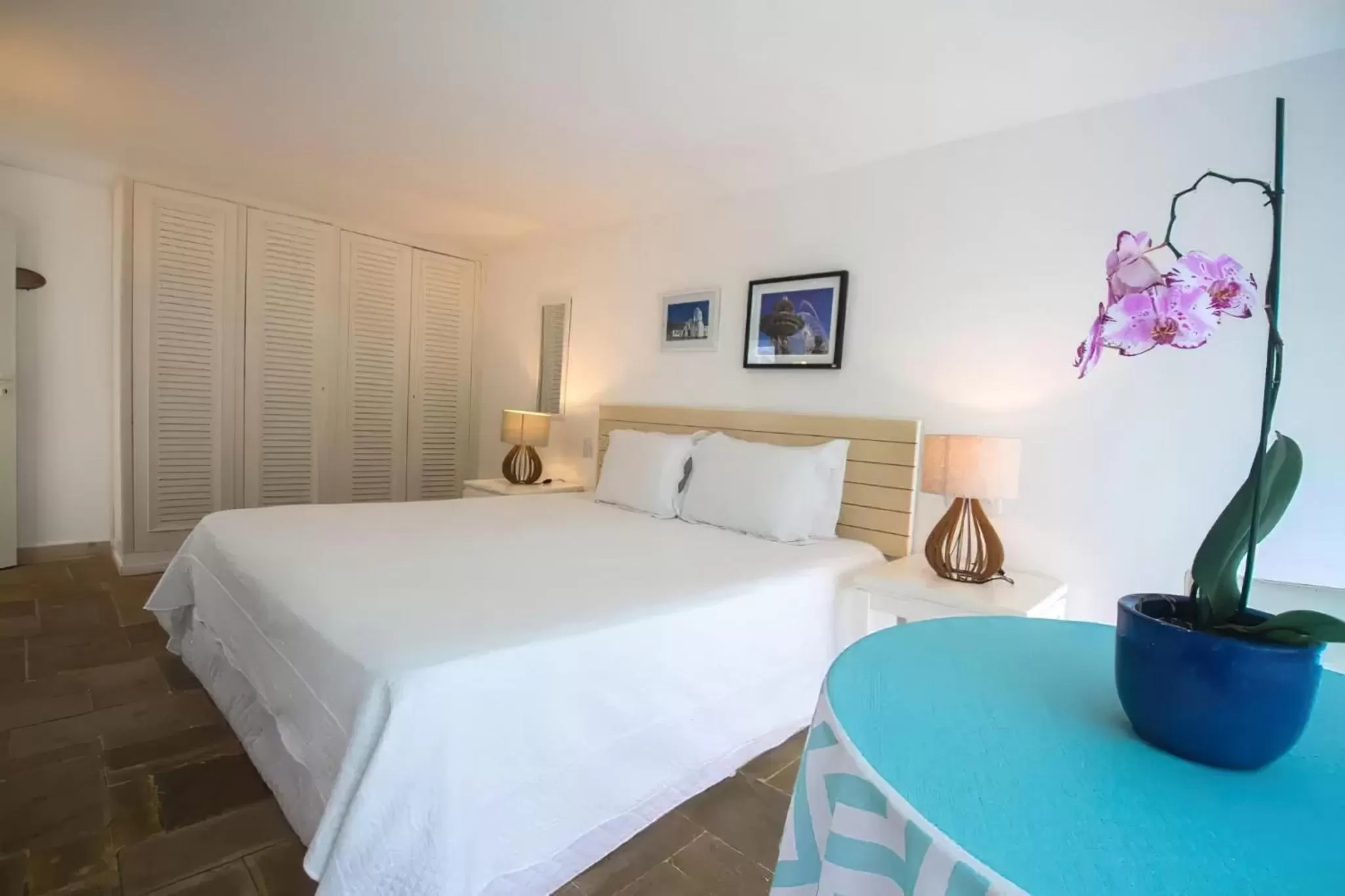 Bed in Guest House Guarujá