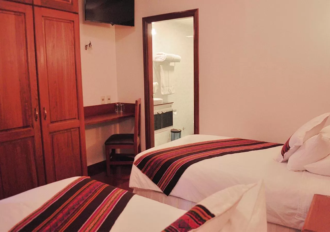 Photo of the whole room, Bed in Qantu Hotel