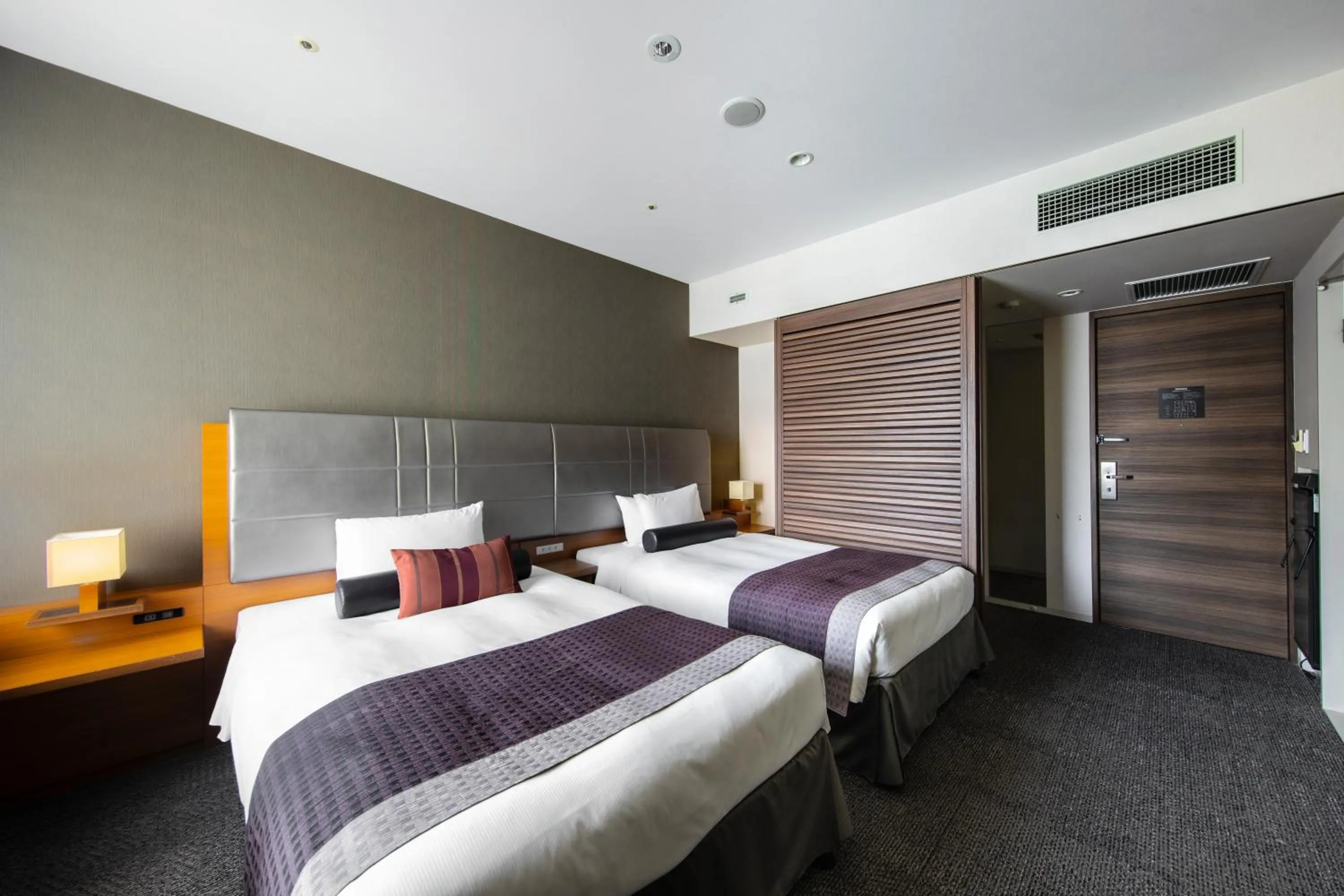 Bed in Tokyu Stay Kamata - Tokyo Haneda