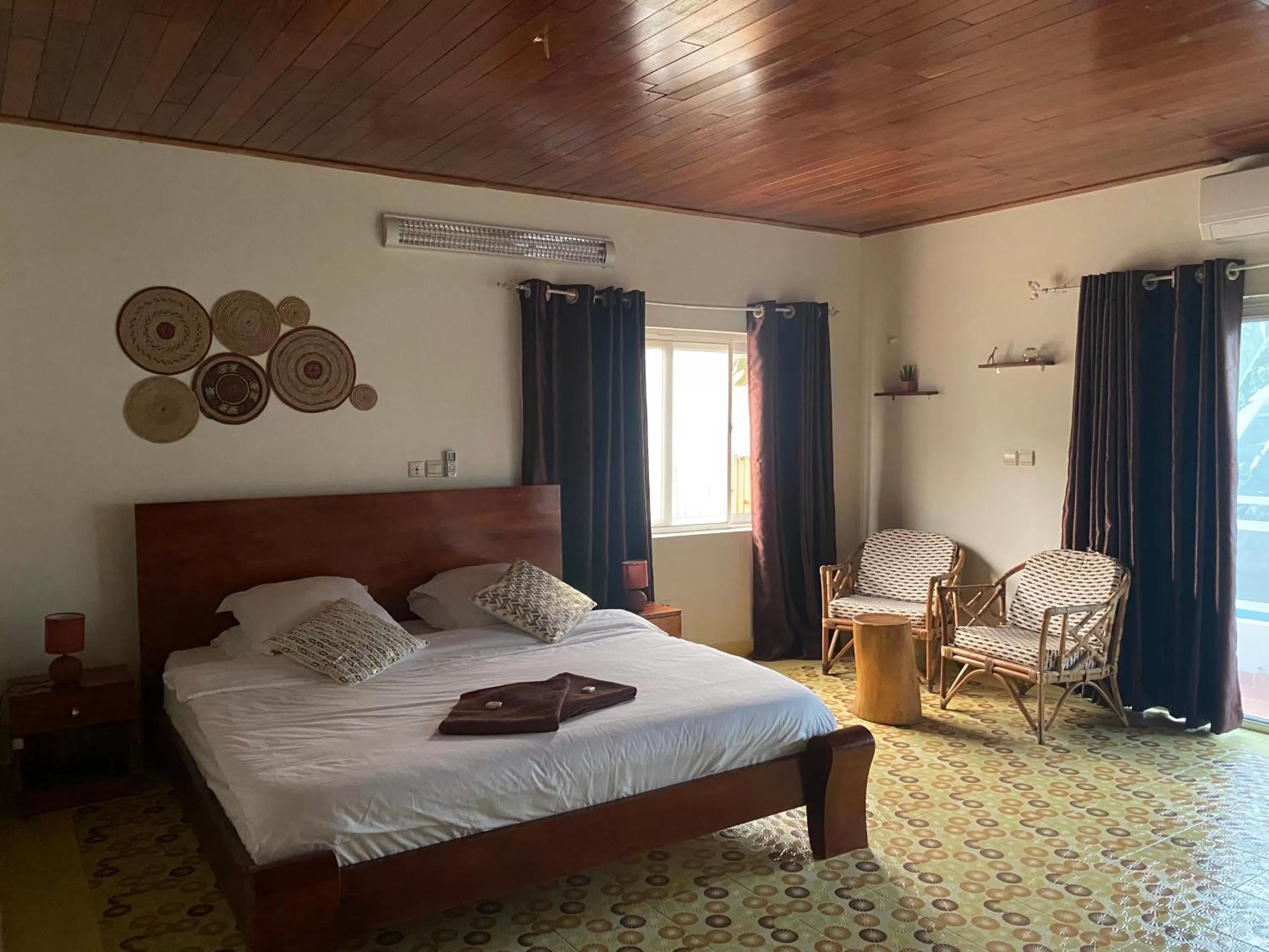 Bed in L'Oasis Guesthouse