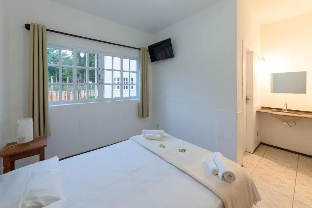 Bed in Pousada Portal de Paraty