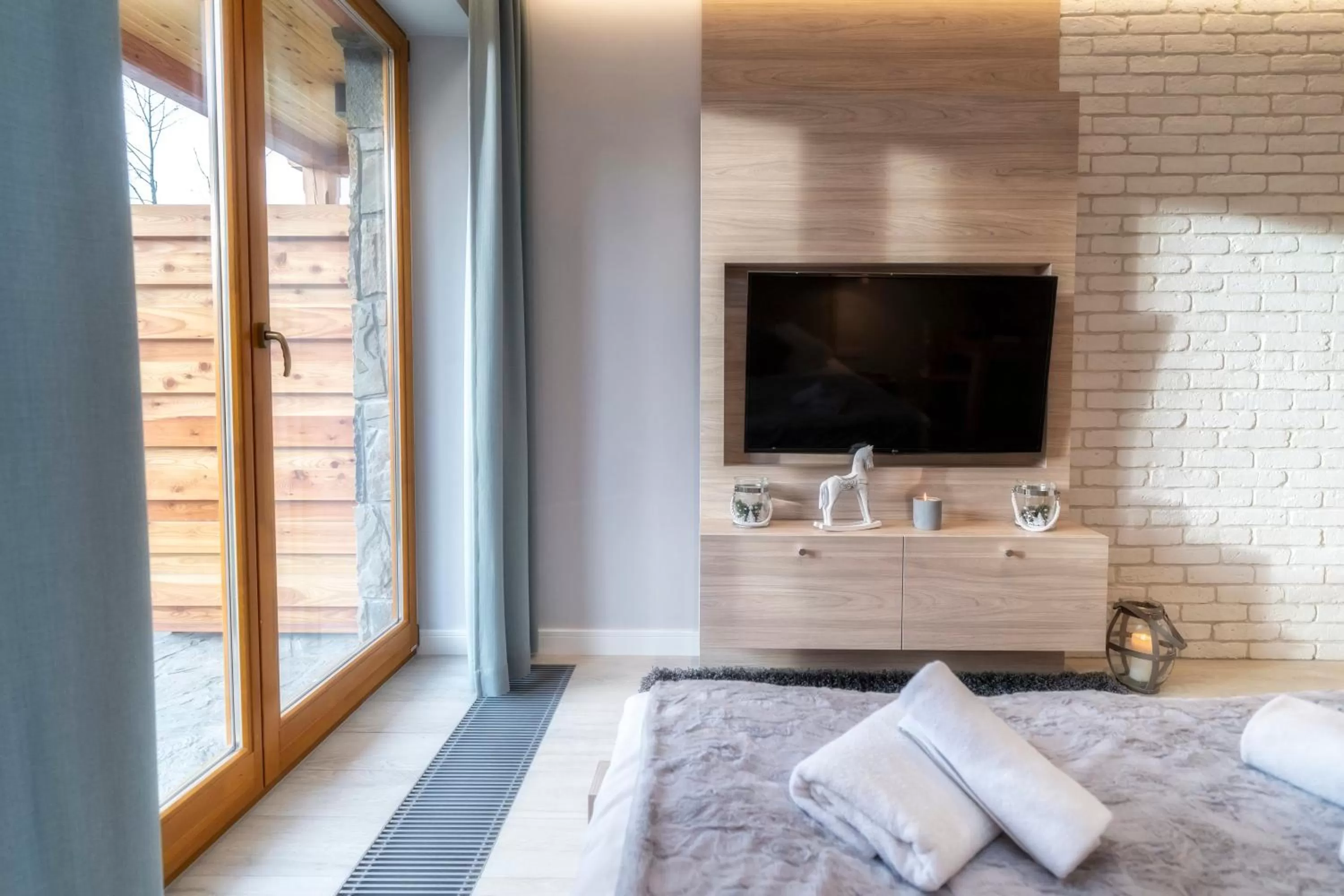 Communal lounge/ TV room in Aparthotel Giewont