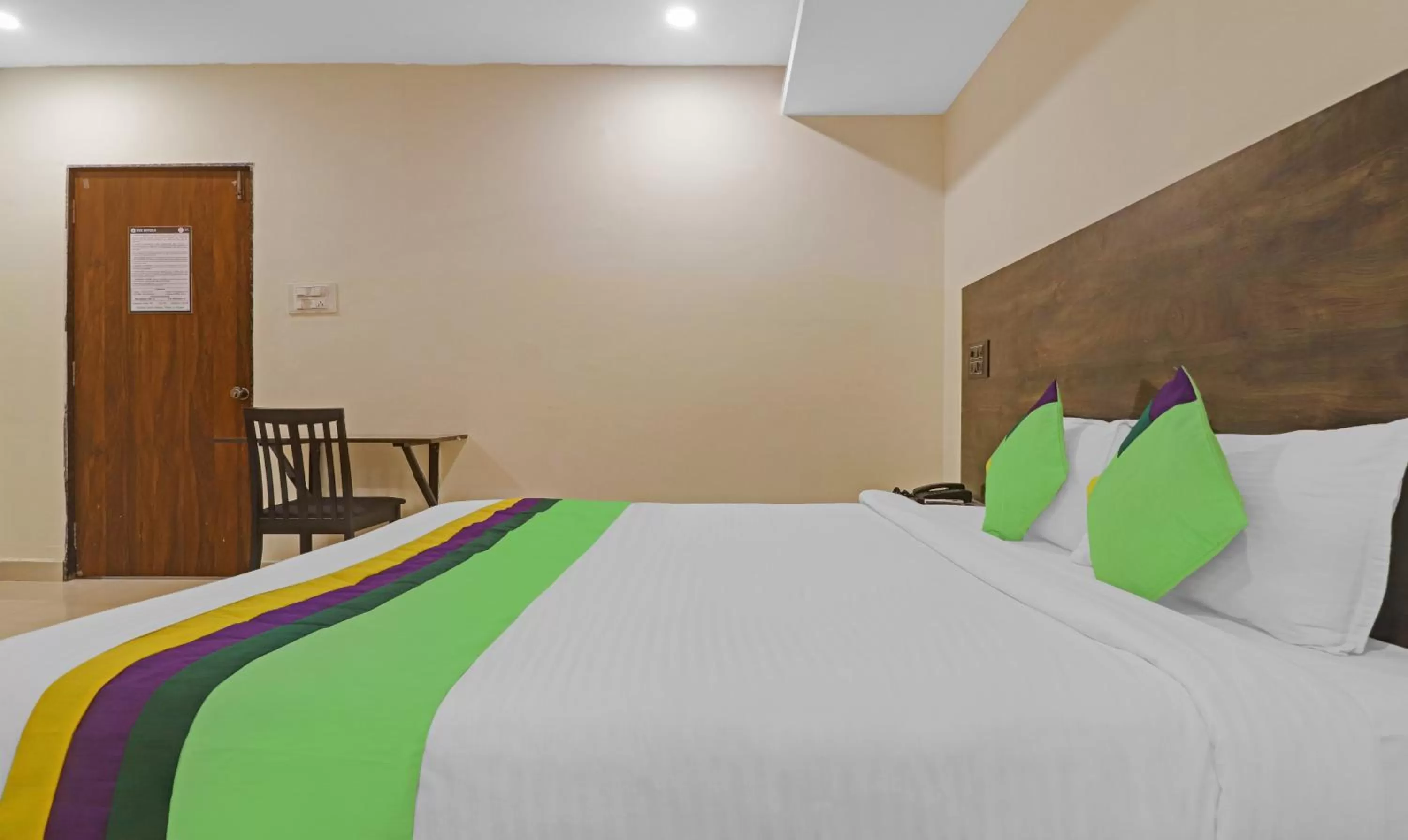 Bedroom, Bed in Treebo Trend Tee