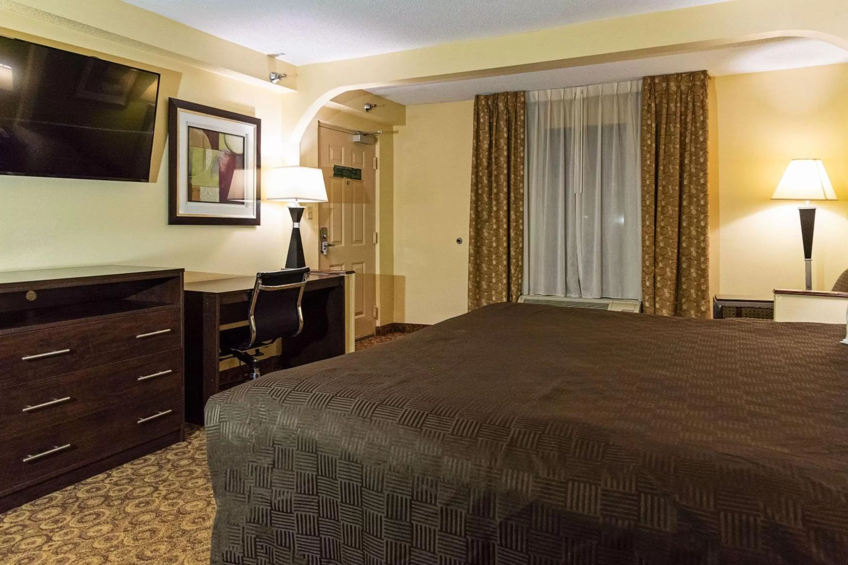 Photo of the whole room, Bed in Rodeway Inn & Suites Clarksville near Governors Square Mall
