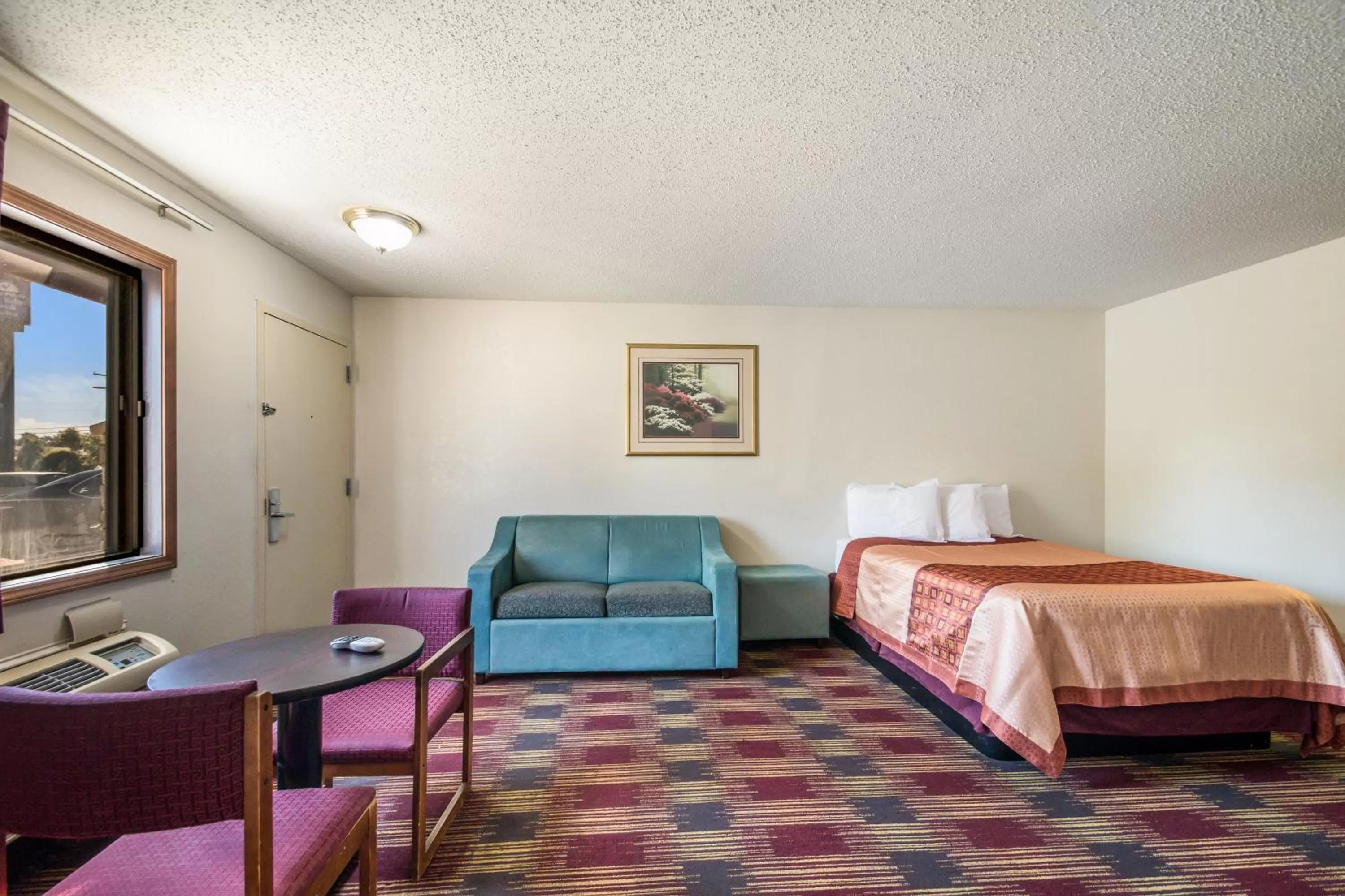Bed in Americas Best Value Inn & Suites Harrisonville