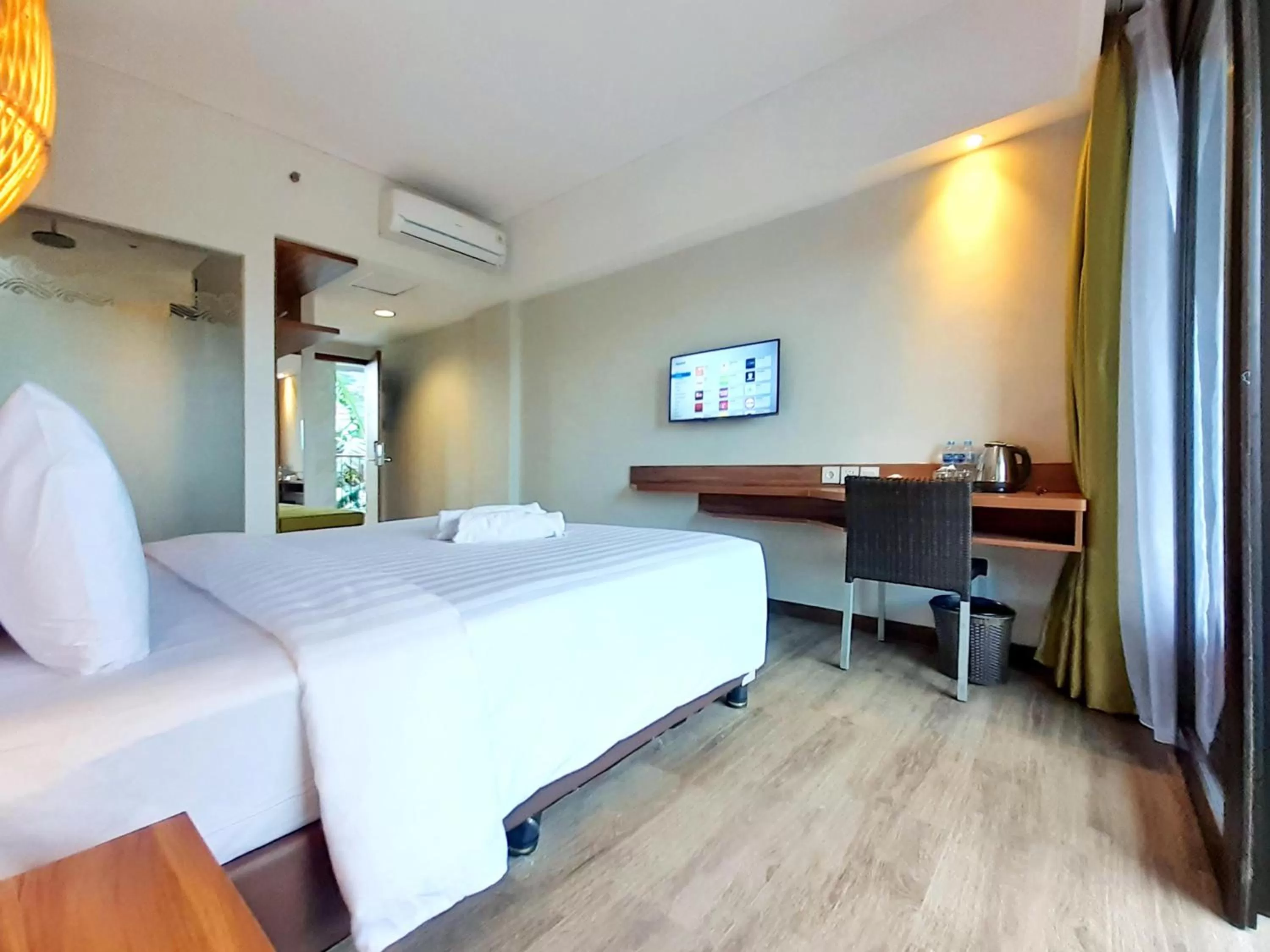 Bed in The Batu Hotel & Villas