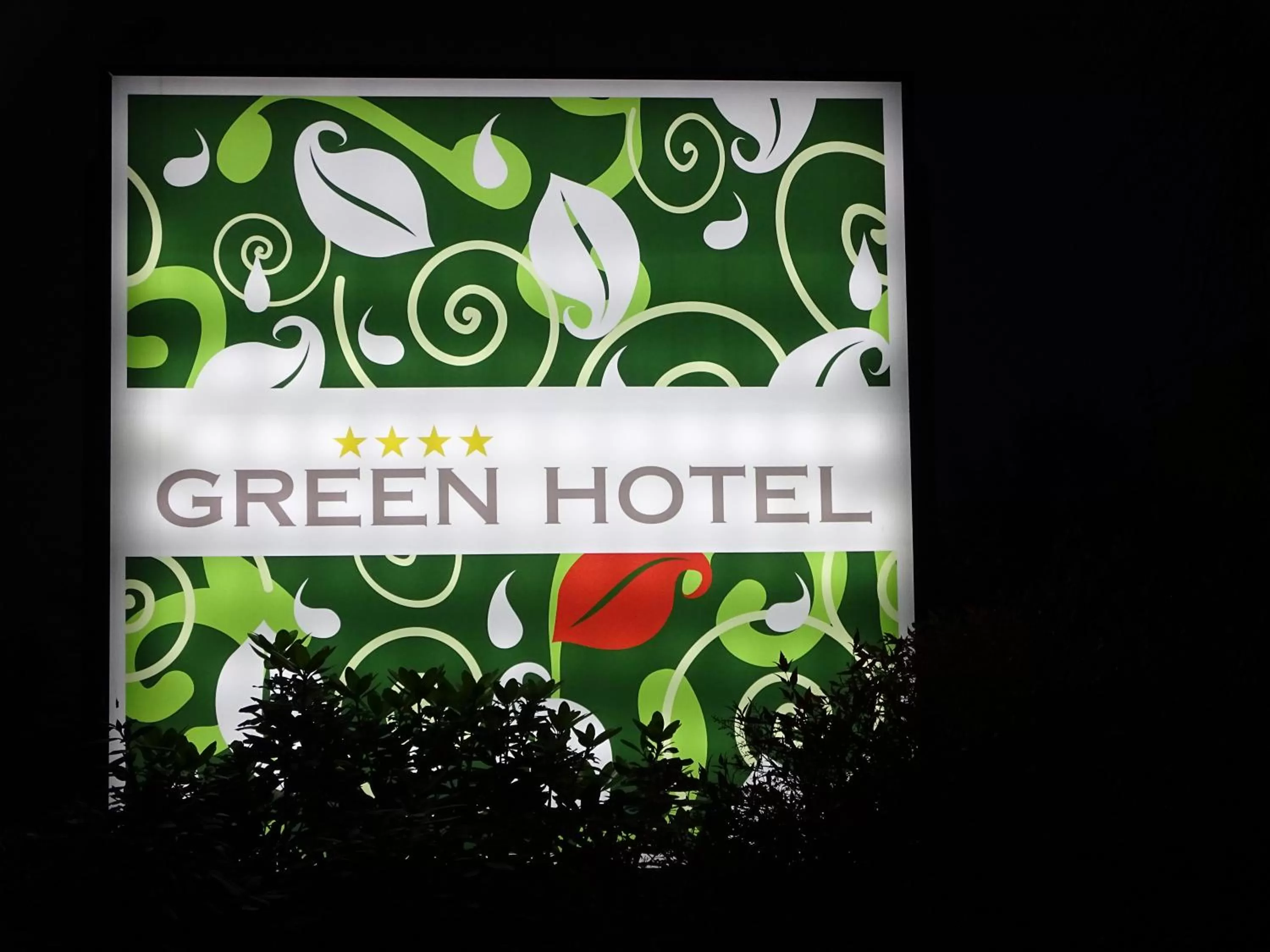 Property logo or sign in Green Hotel