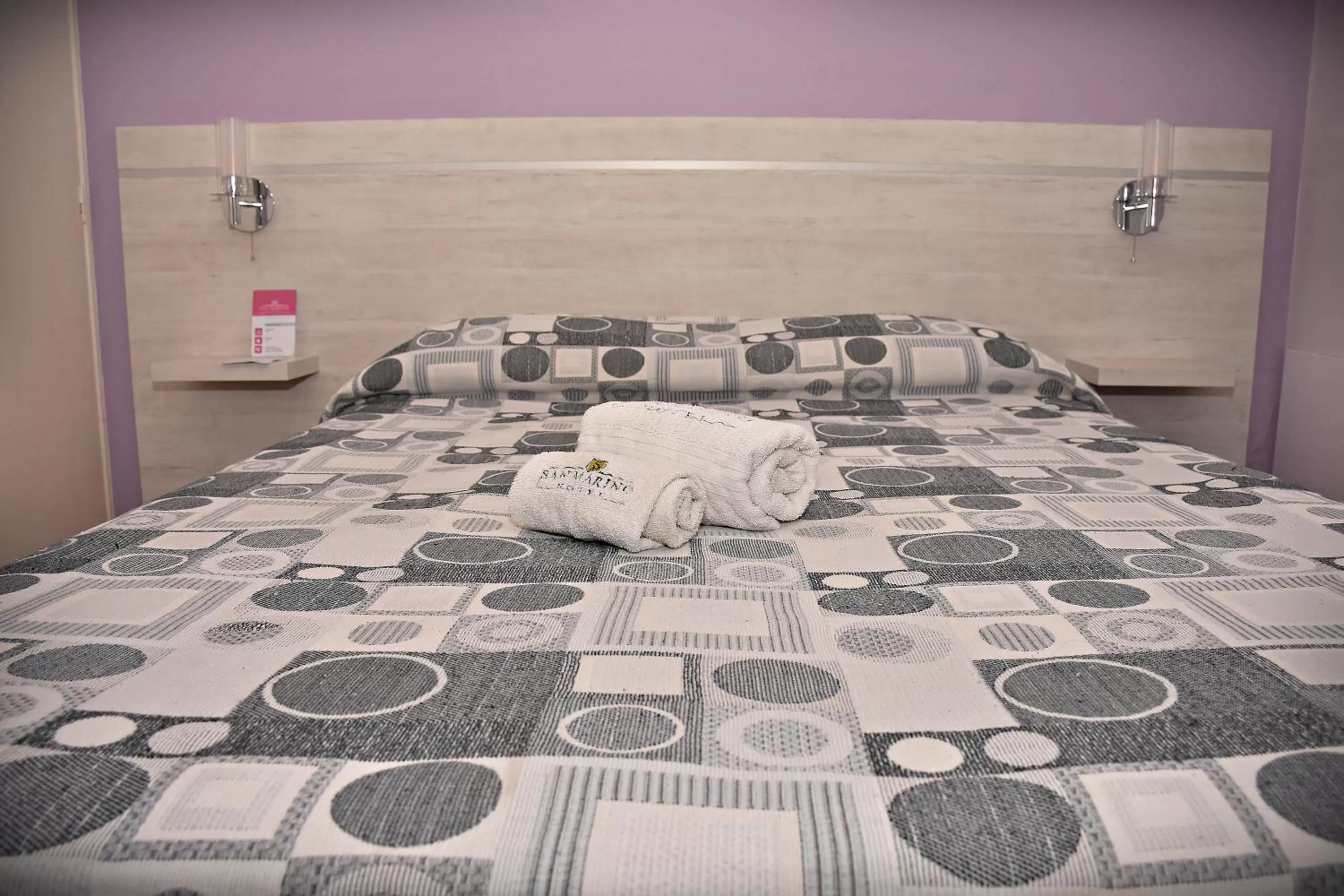 Bed in Hotel San Marino