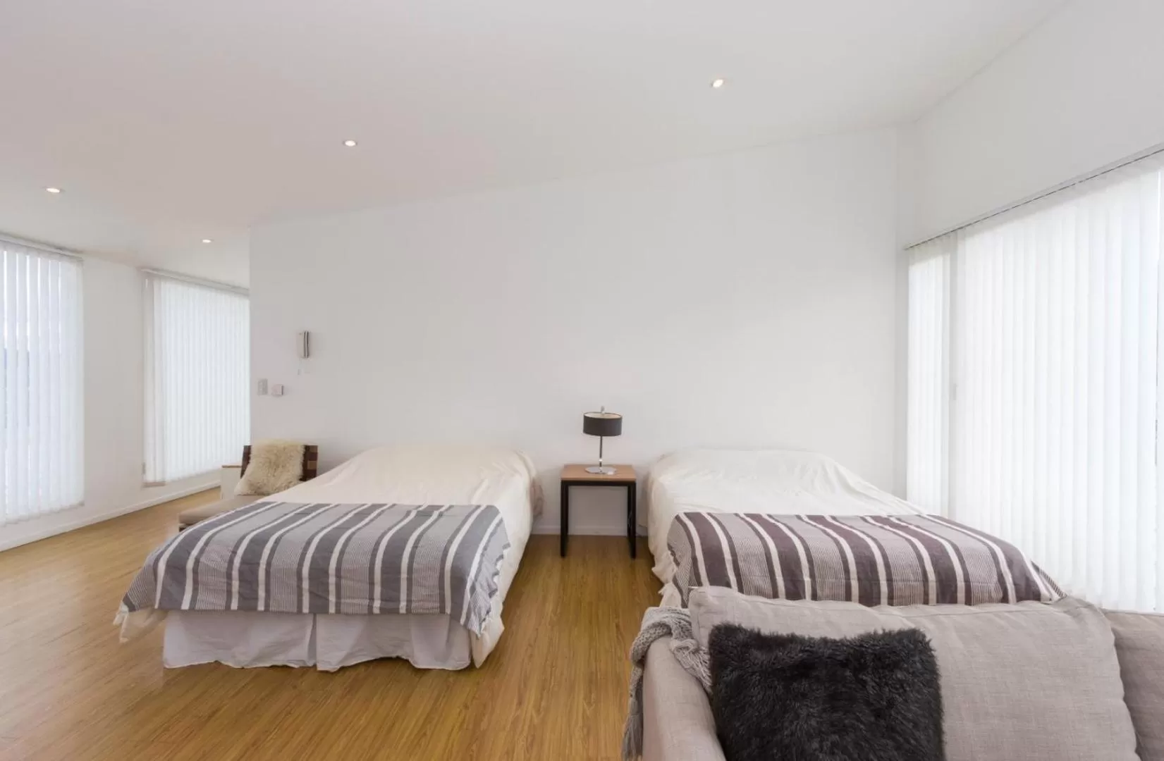 Bed in De la Costa Apartamentos