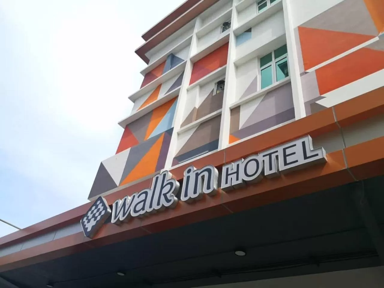 Property building in Walk In Hotel