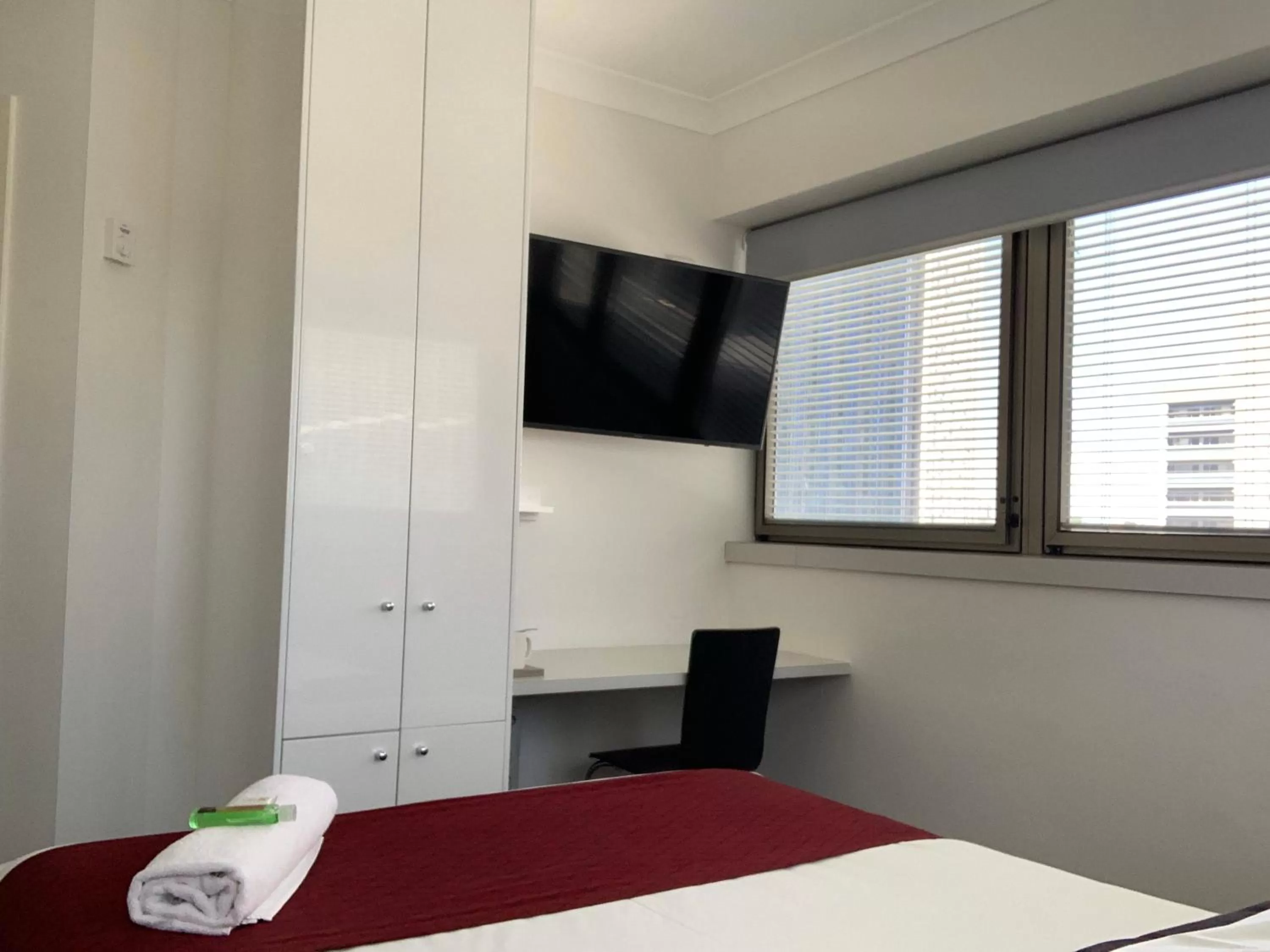 Bed in George Hotel Brisbane, Independent Collection by EVT