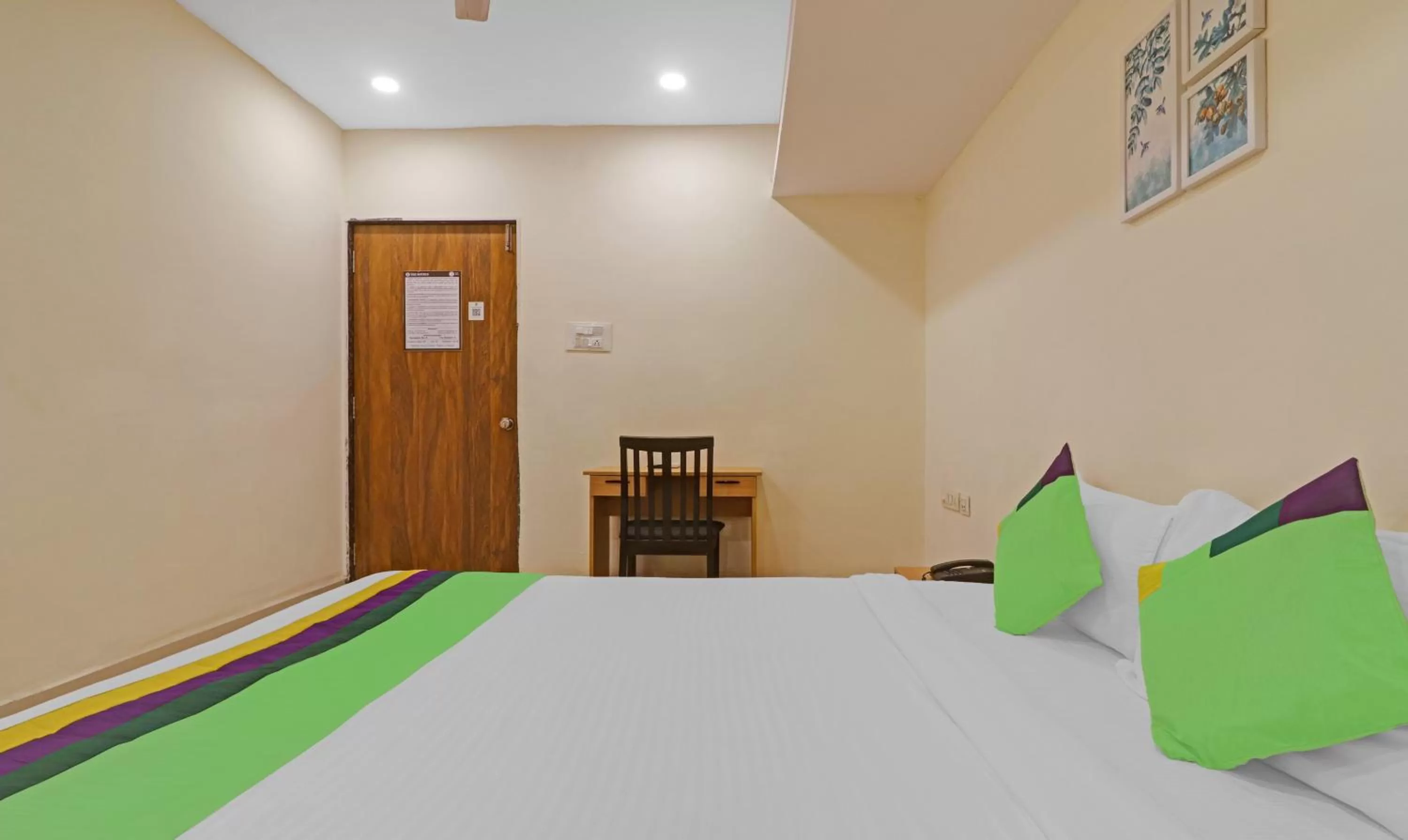 Bedroom, Bed in Treebo Trend Tee