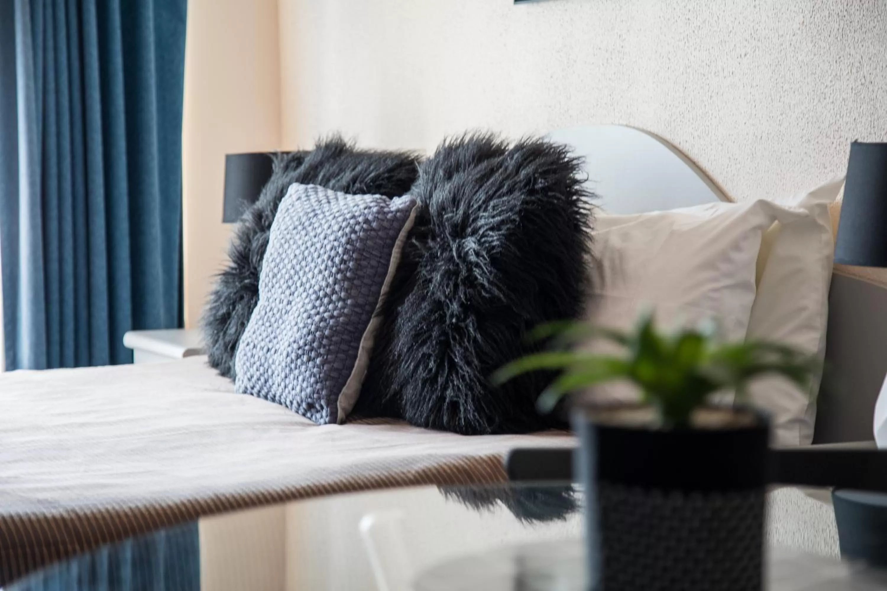 Bed in Mid City Motel