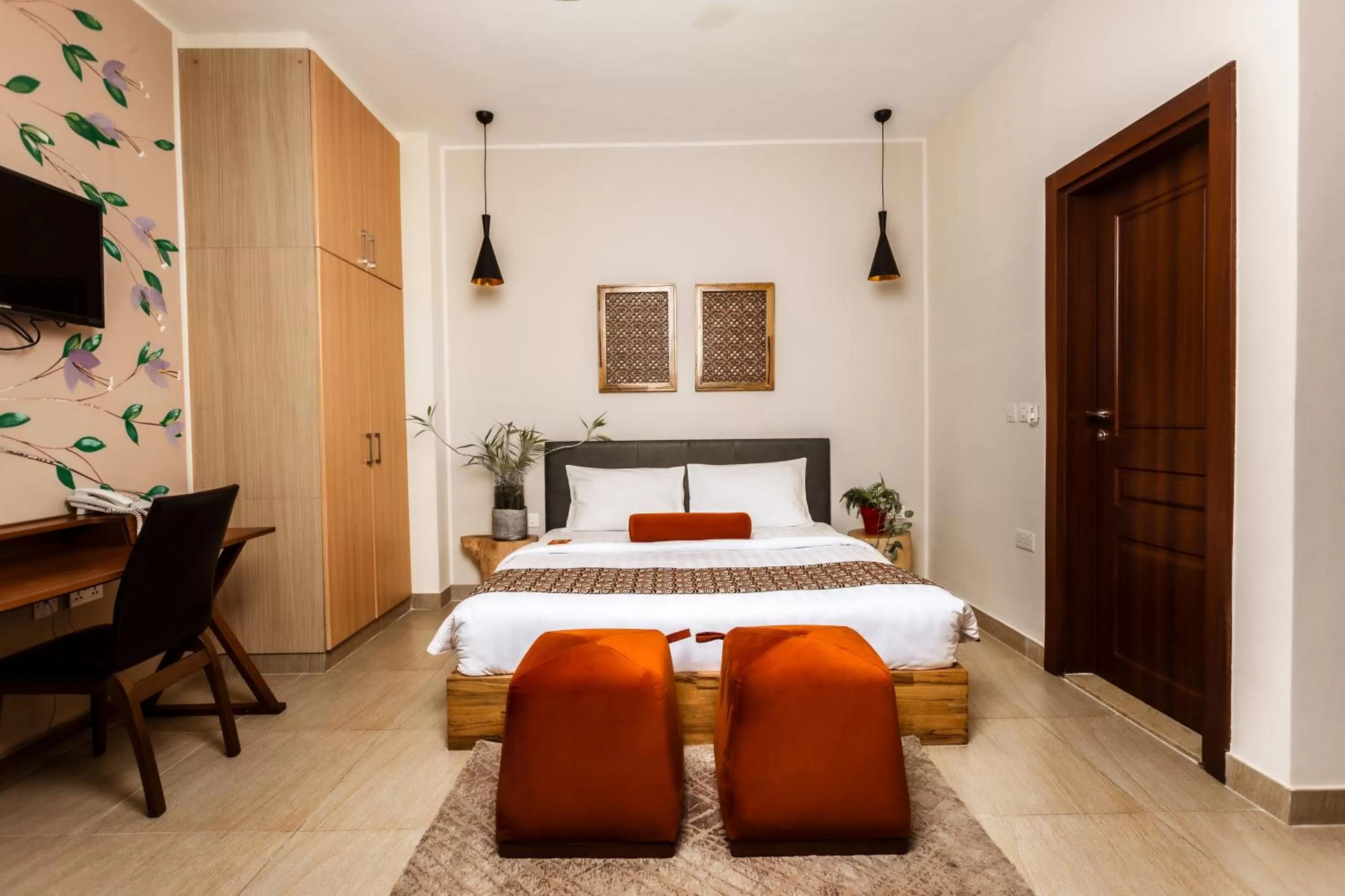 Bed in Roots Hotel Apartment