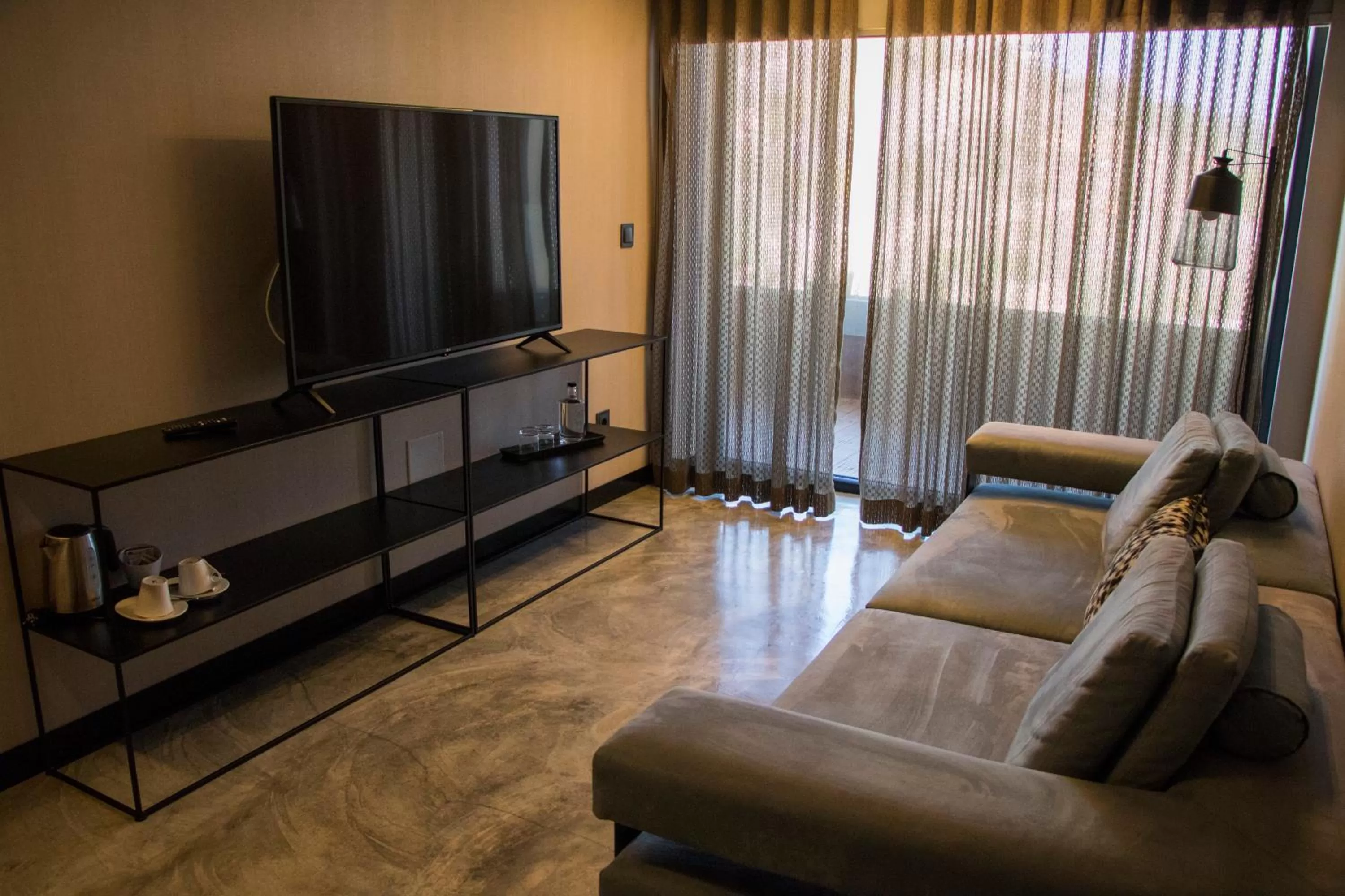 Communal lounge/ TV room, Bed in Well Hotel & Spa