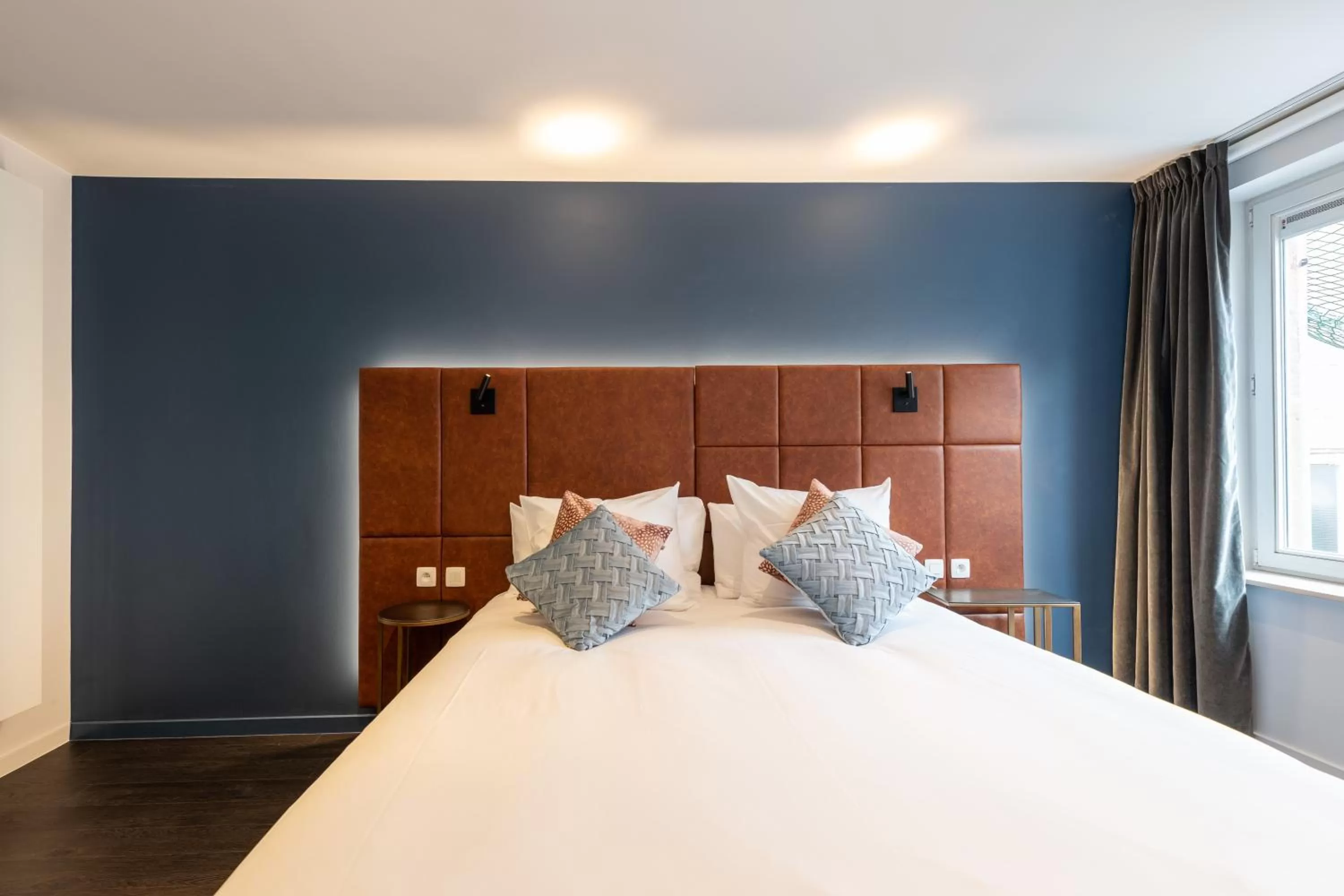 Bed in Boutique Hotel Sablon by CW Hotel Collection