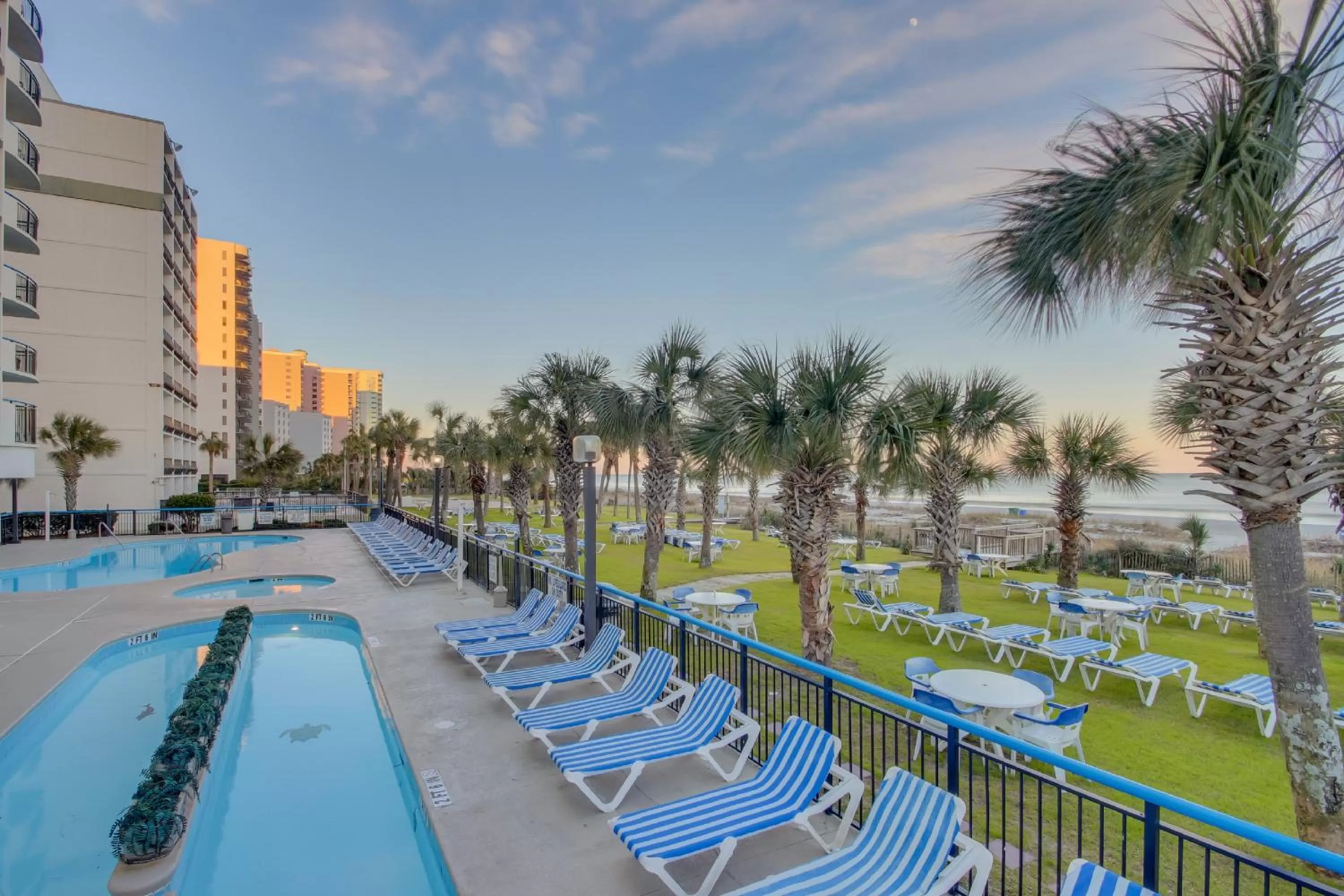 Swimming pool in Boardwalk Beach Resort Condo w Oceanfront Balcony