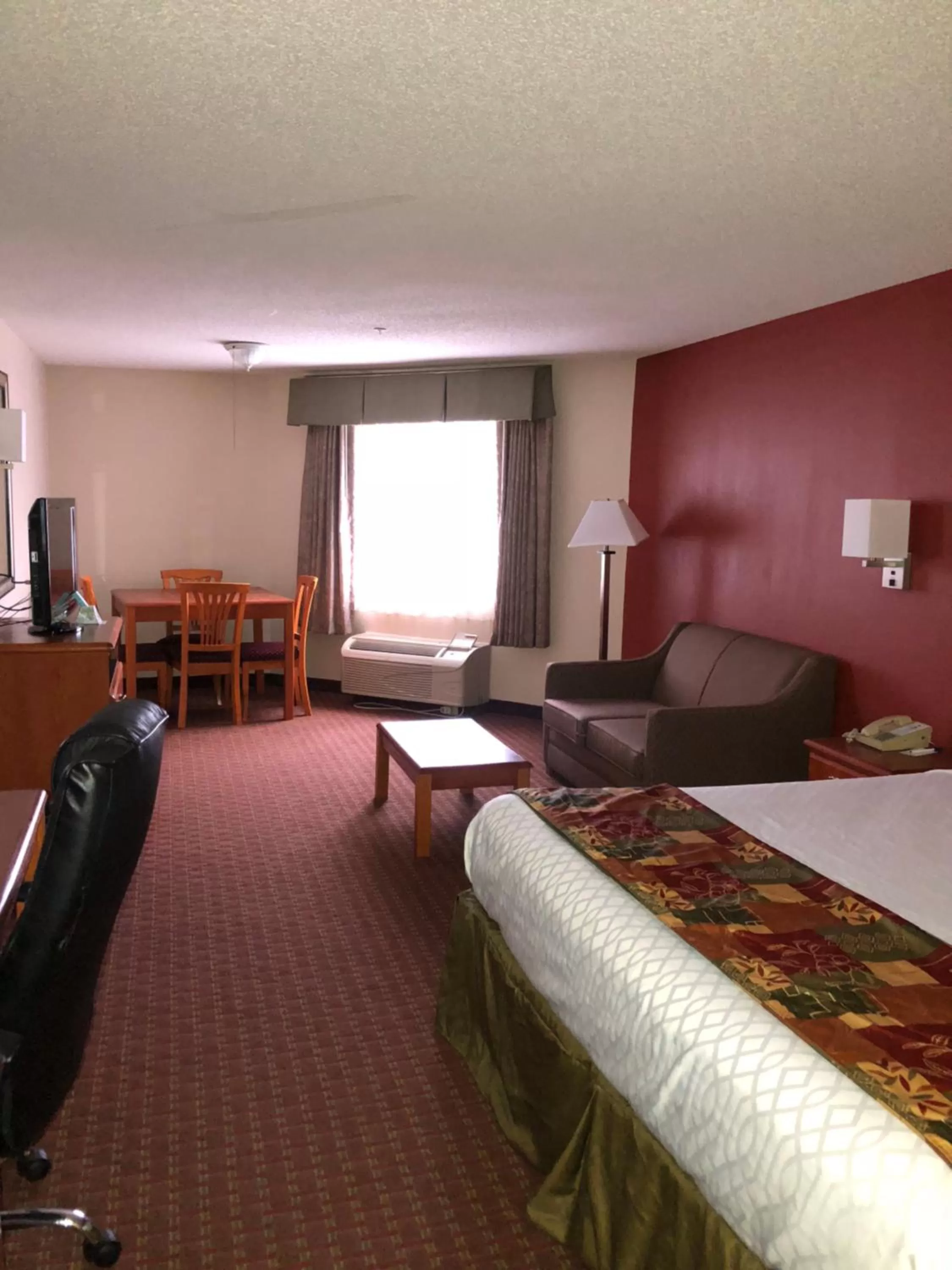 Bed in Millennium Inn