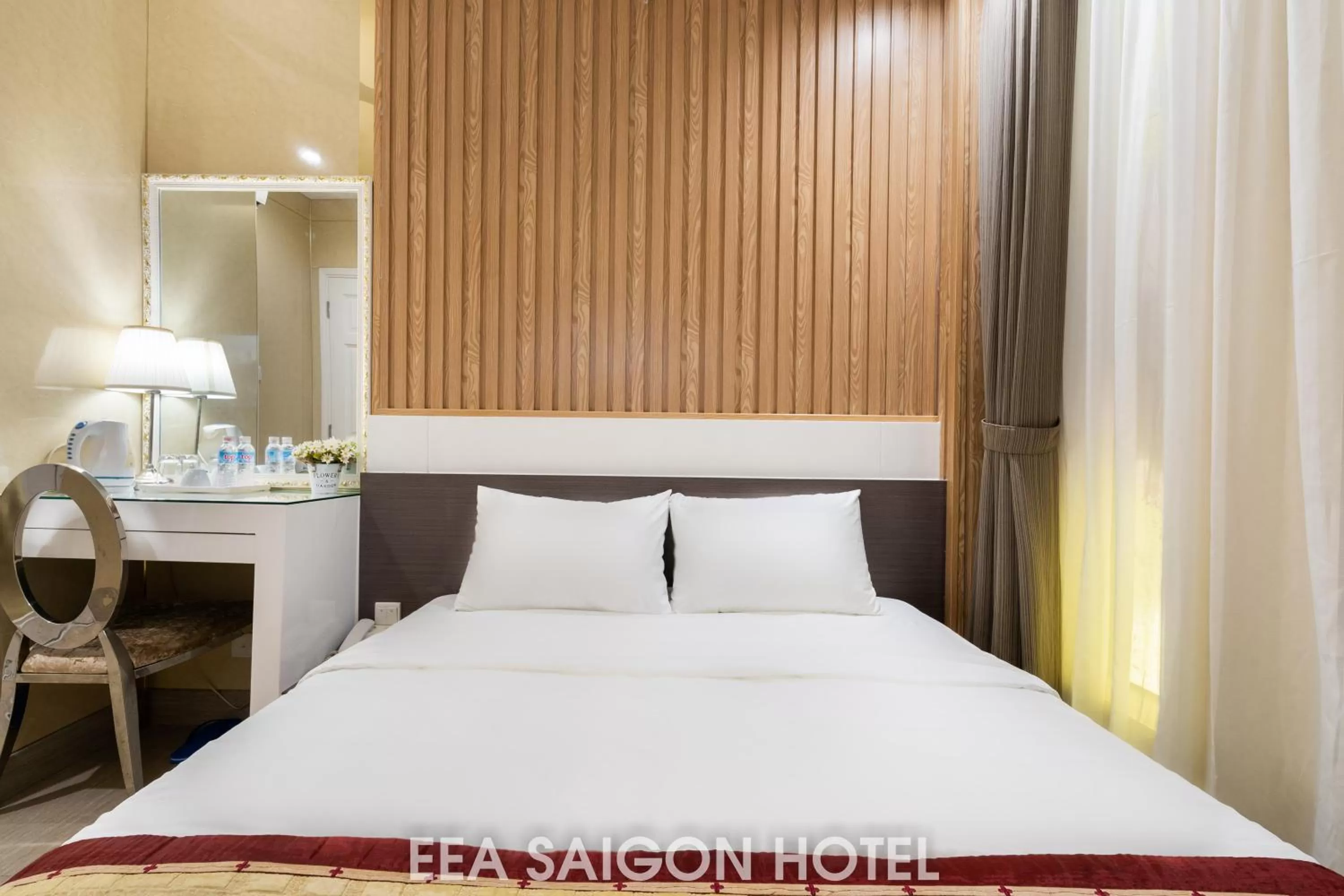 Bed in EEA Central Saigon Hotel