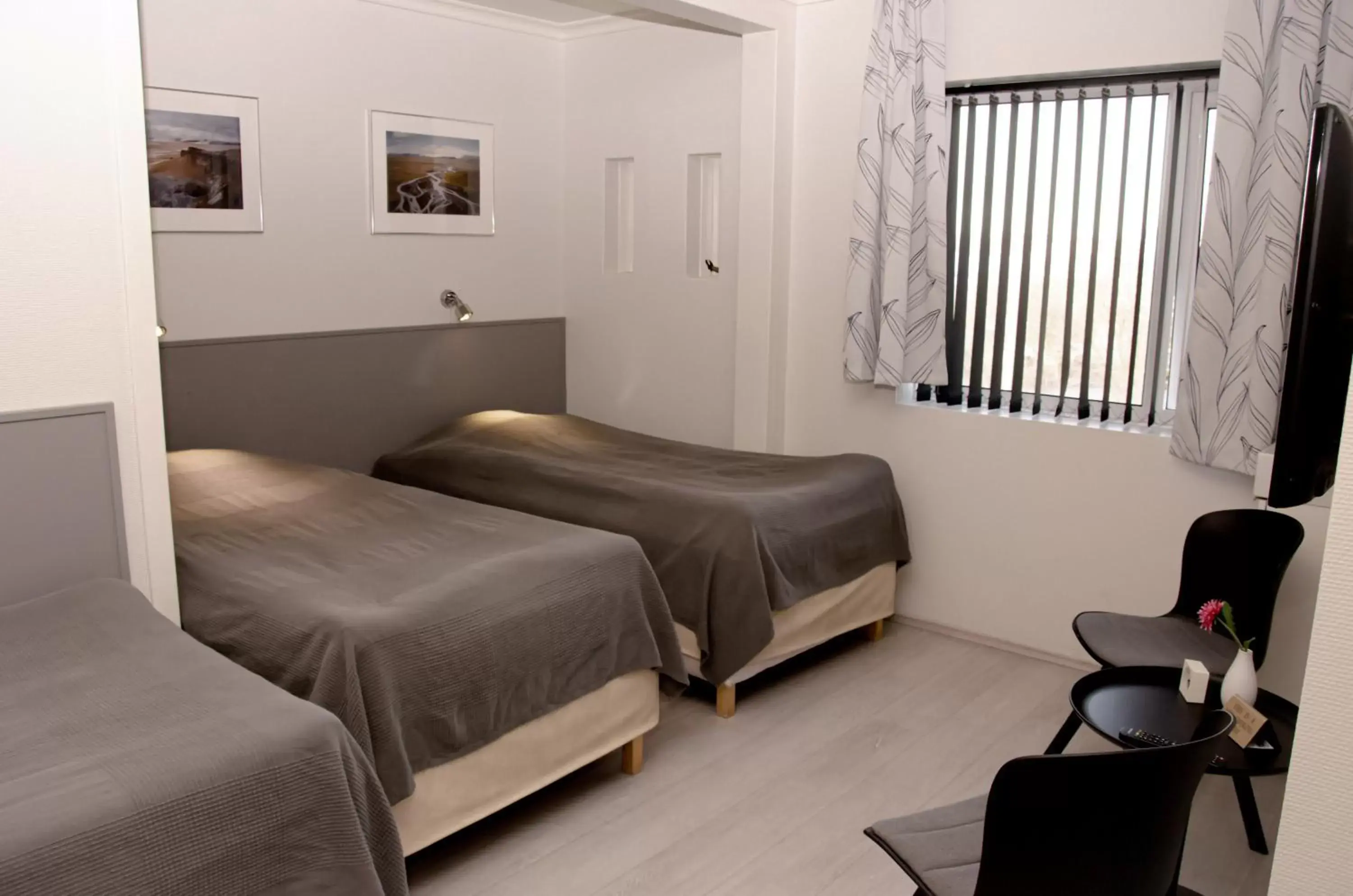 Triple Room with Shared Bathroom in B&B Guesthouse - Bed and Breakfast Keflavik Centre Triple Room with Shared Bathroom in B&B Guesthouse - Bed and Breakfast Keflavik Centre