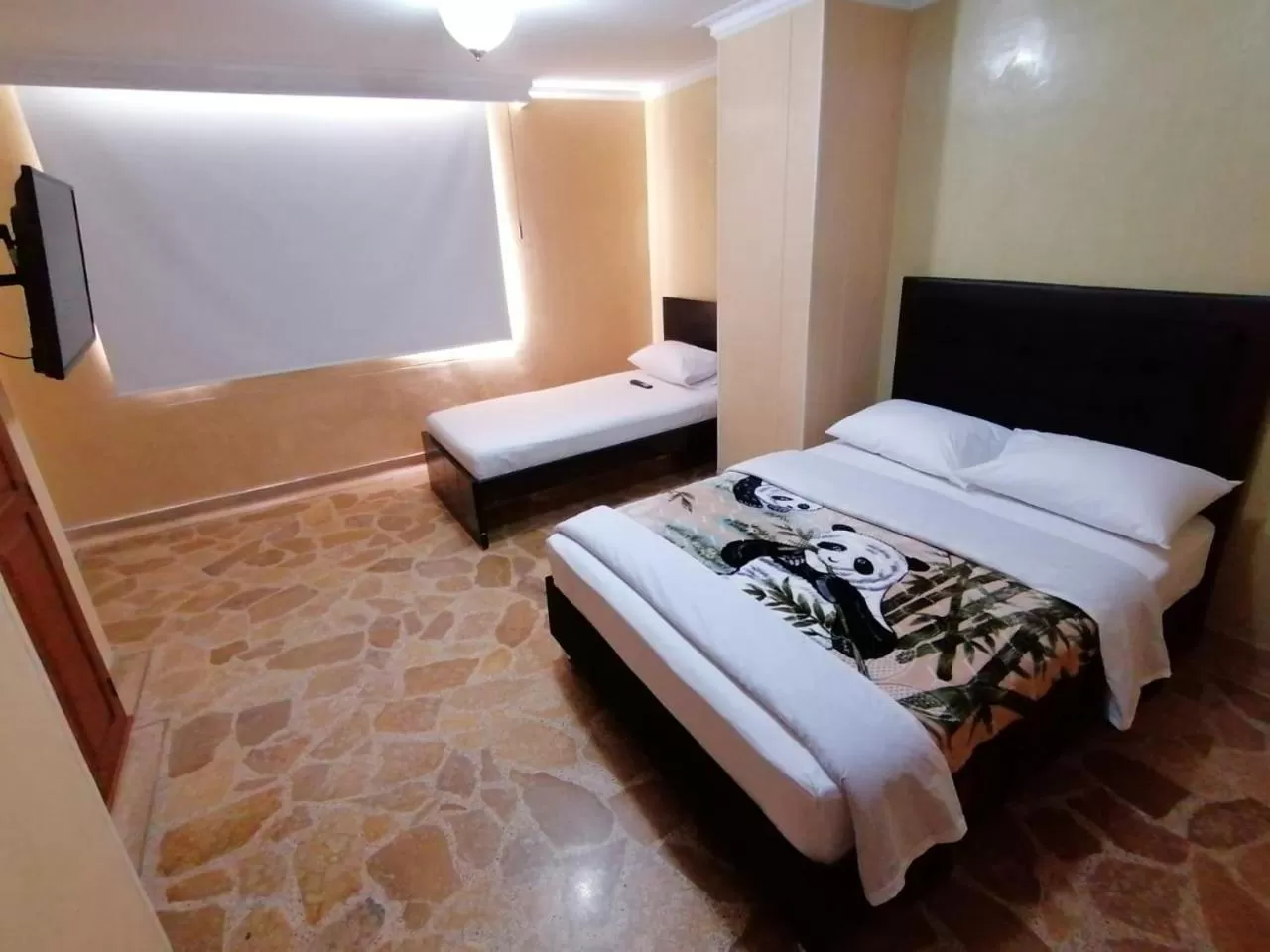 Photo of the whole room, Bed in HOTEL GOLDEN SUITE