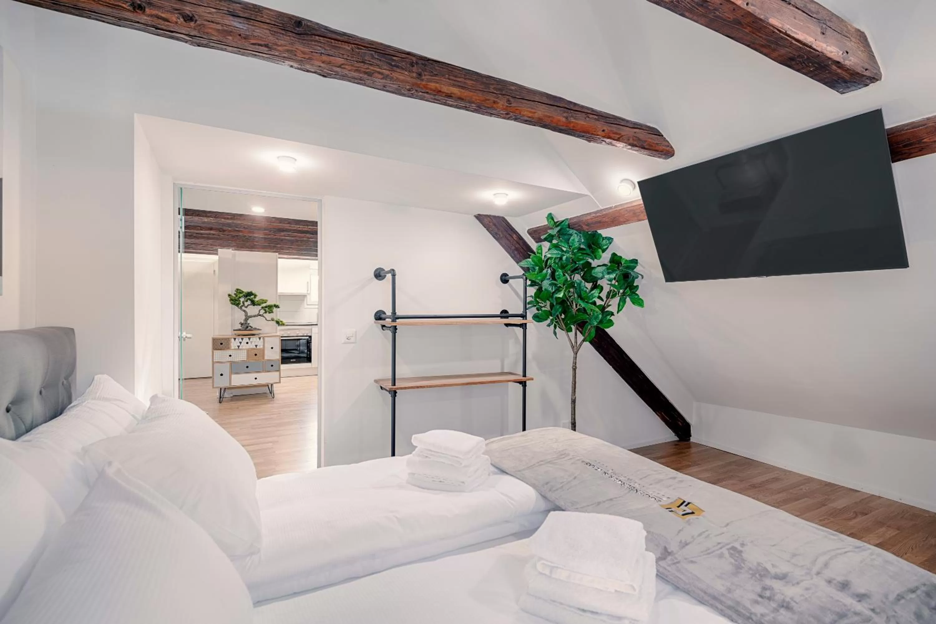 Bed in VISIMO Apartments St Georgen-Strasse St Gallen - Design City Nature