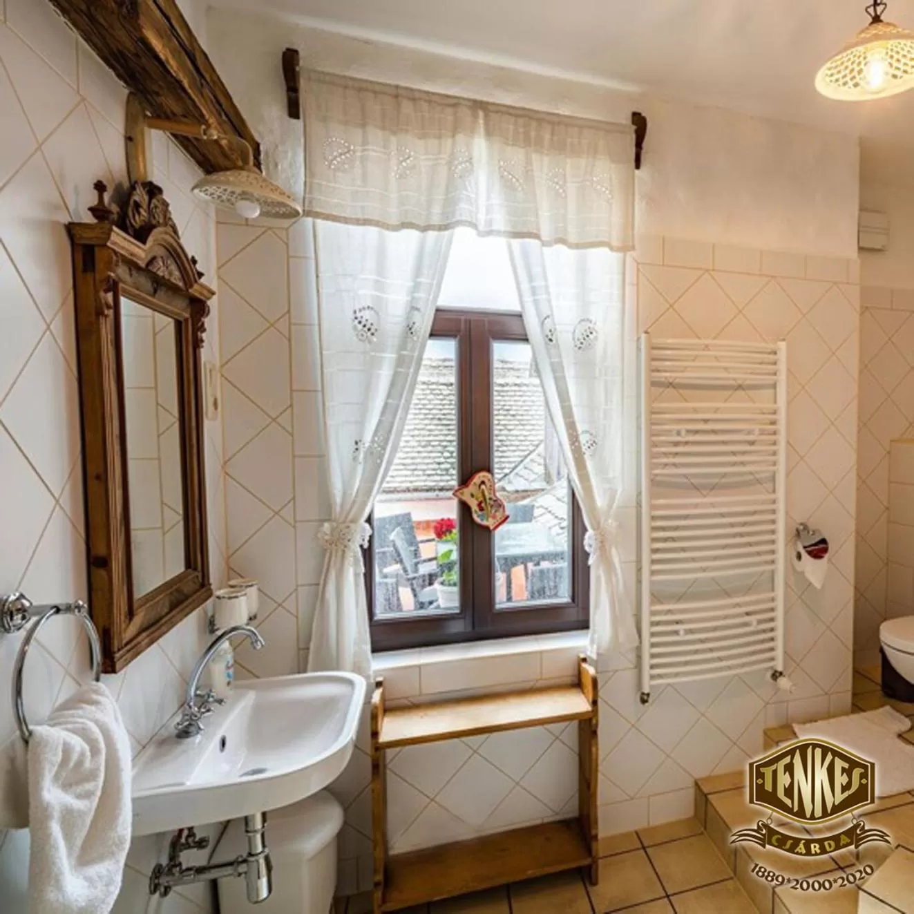 Bathroom in Tenkes Fogadó és Vendégház Harkány