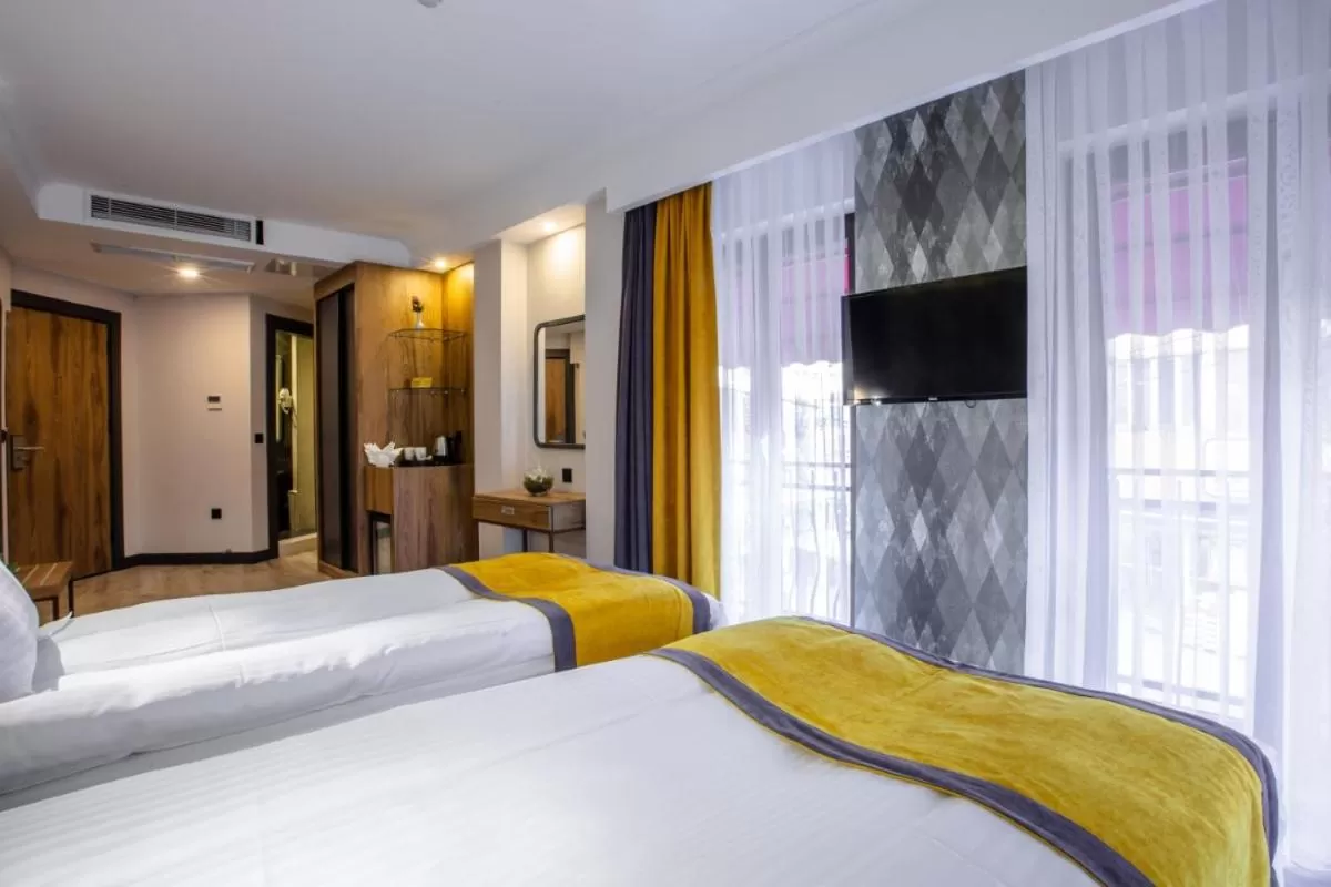 Bed in Kayhan City Hotel