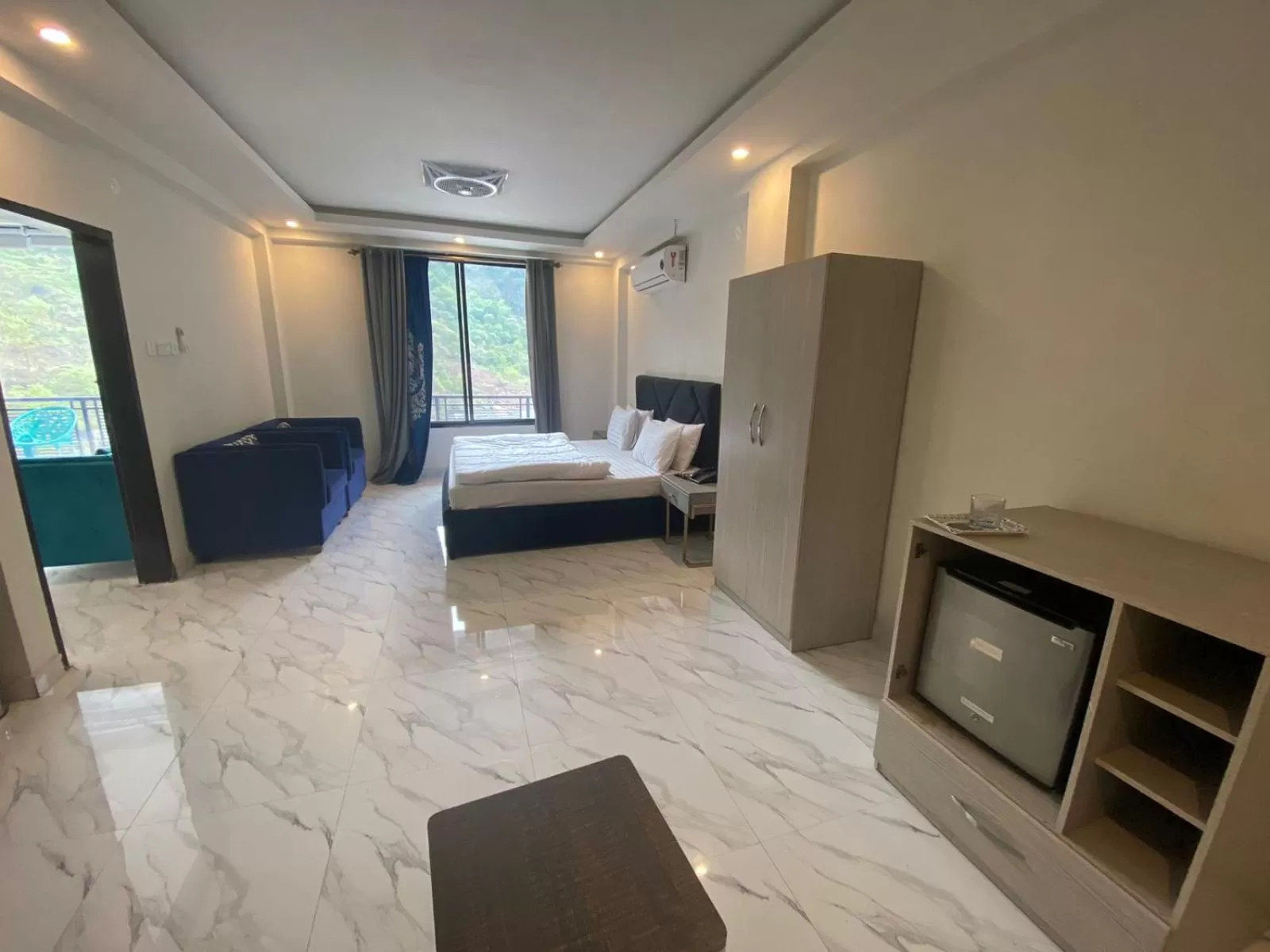 Bed in Hotel La Orilla Muzaffarabad