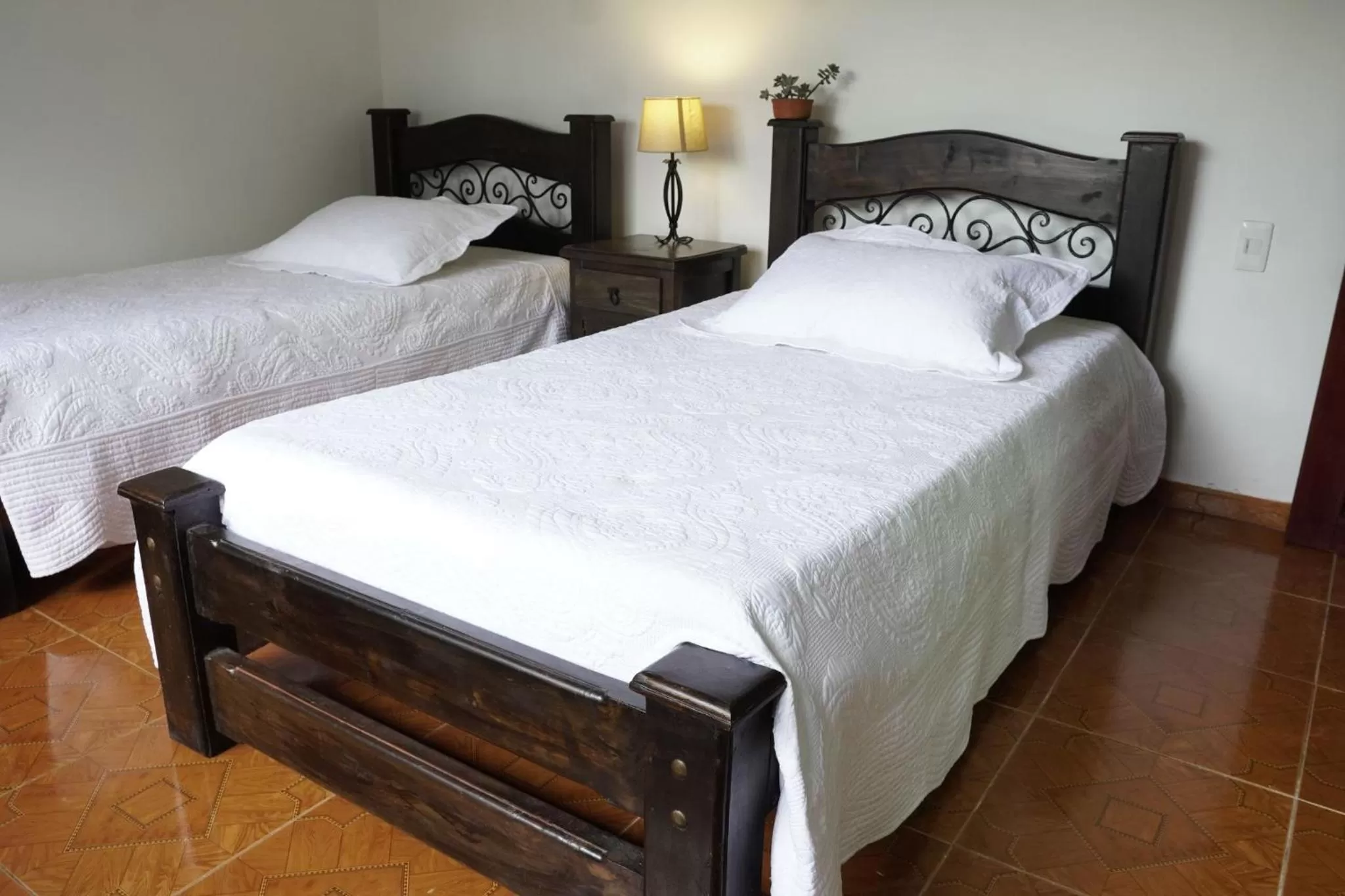 Photo of the whole room, Bed in Hotel Chalet El Castillo by Majuva