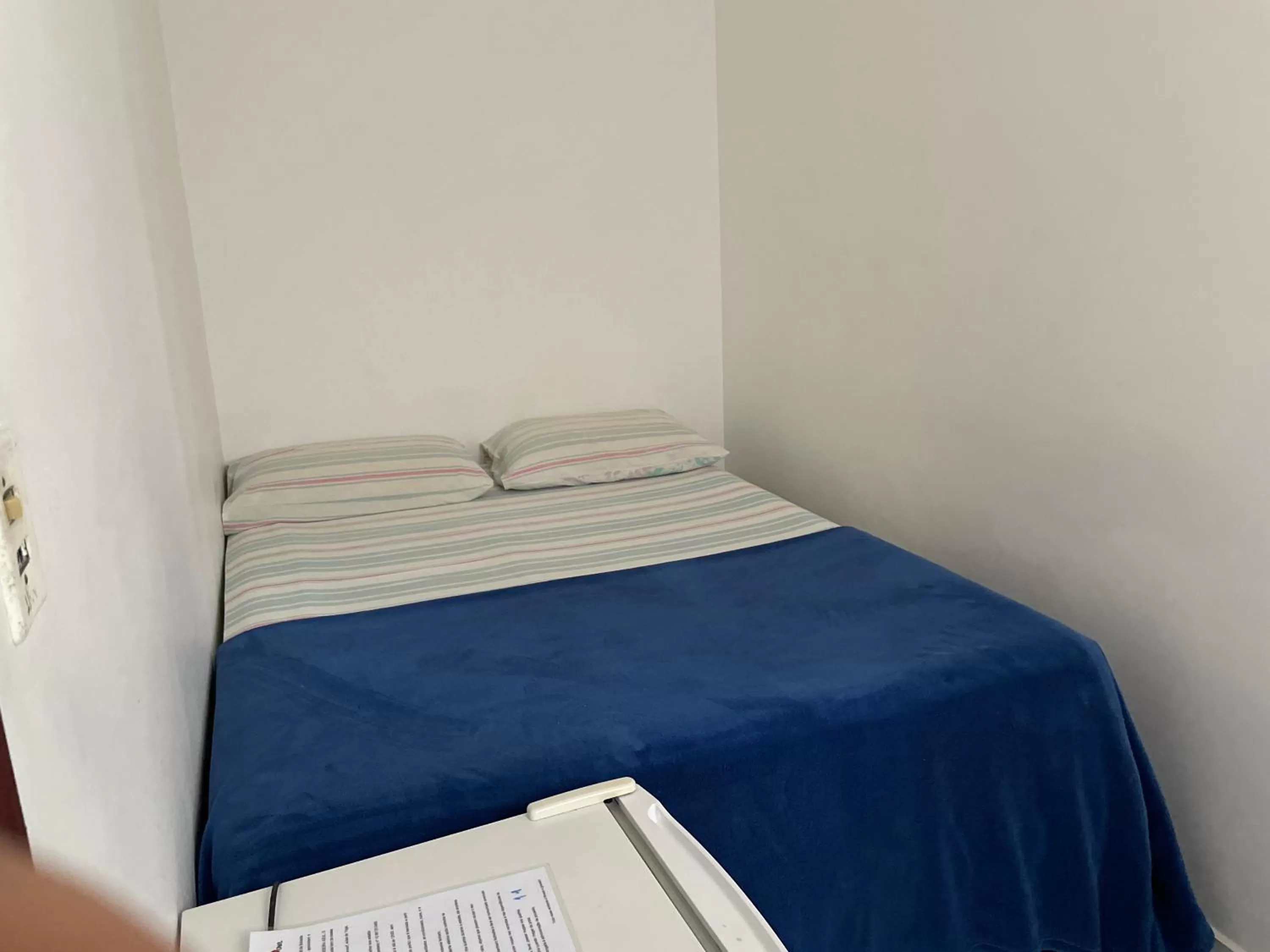 Bed in Pousada Praia do Tombo