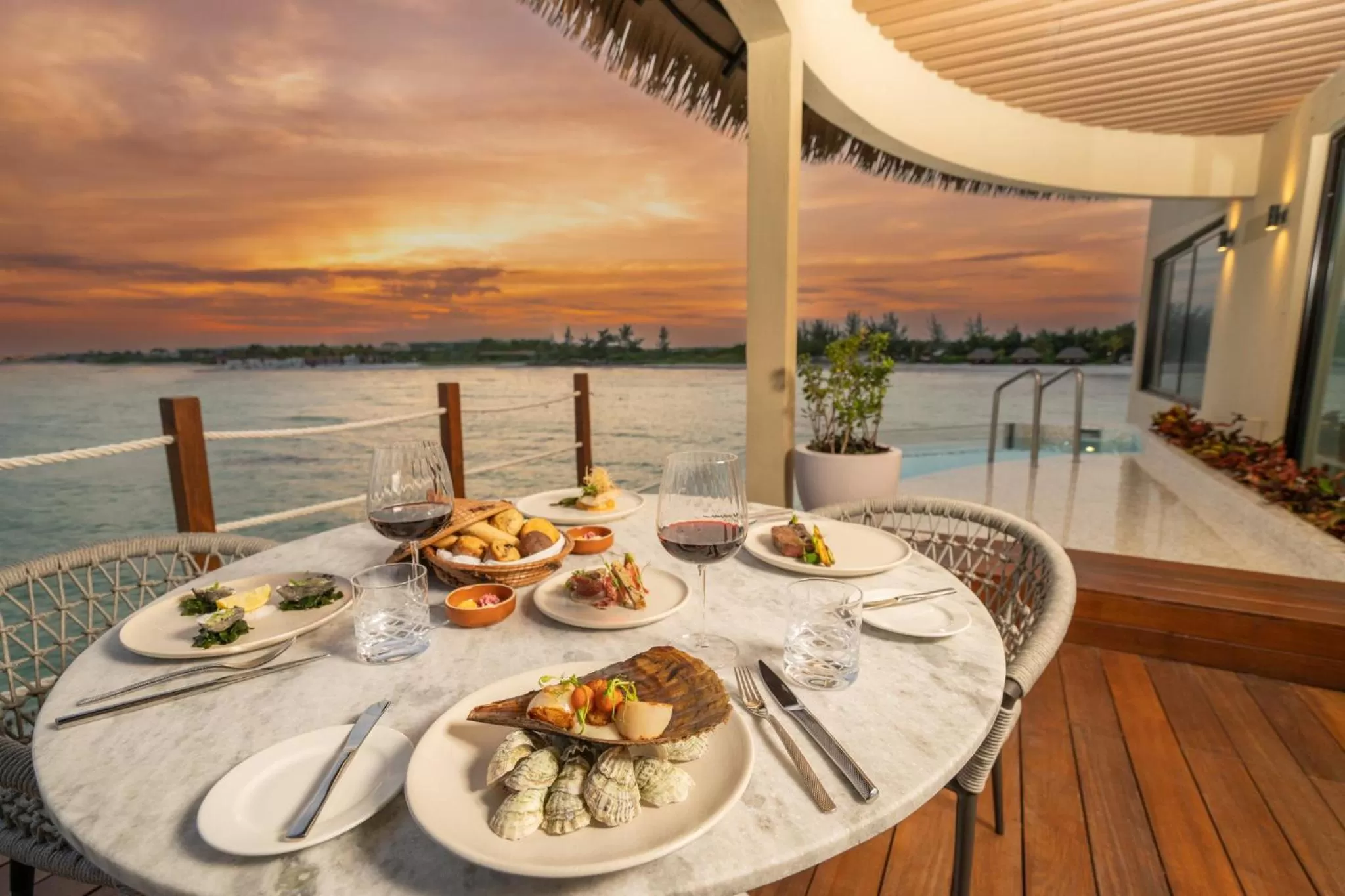 Photo of the whole room in Palafitos Overwater Bungalows at El Dorado Maroma, Gourmet All Inclusive by Karisma - Adults Only
