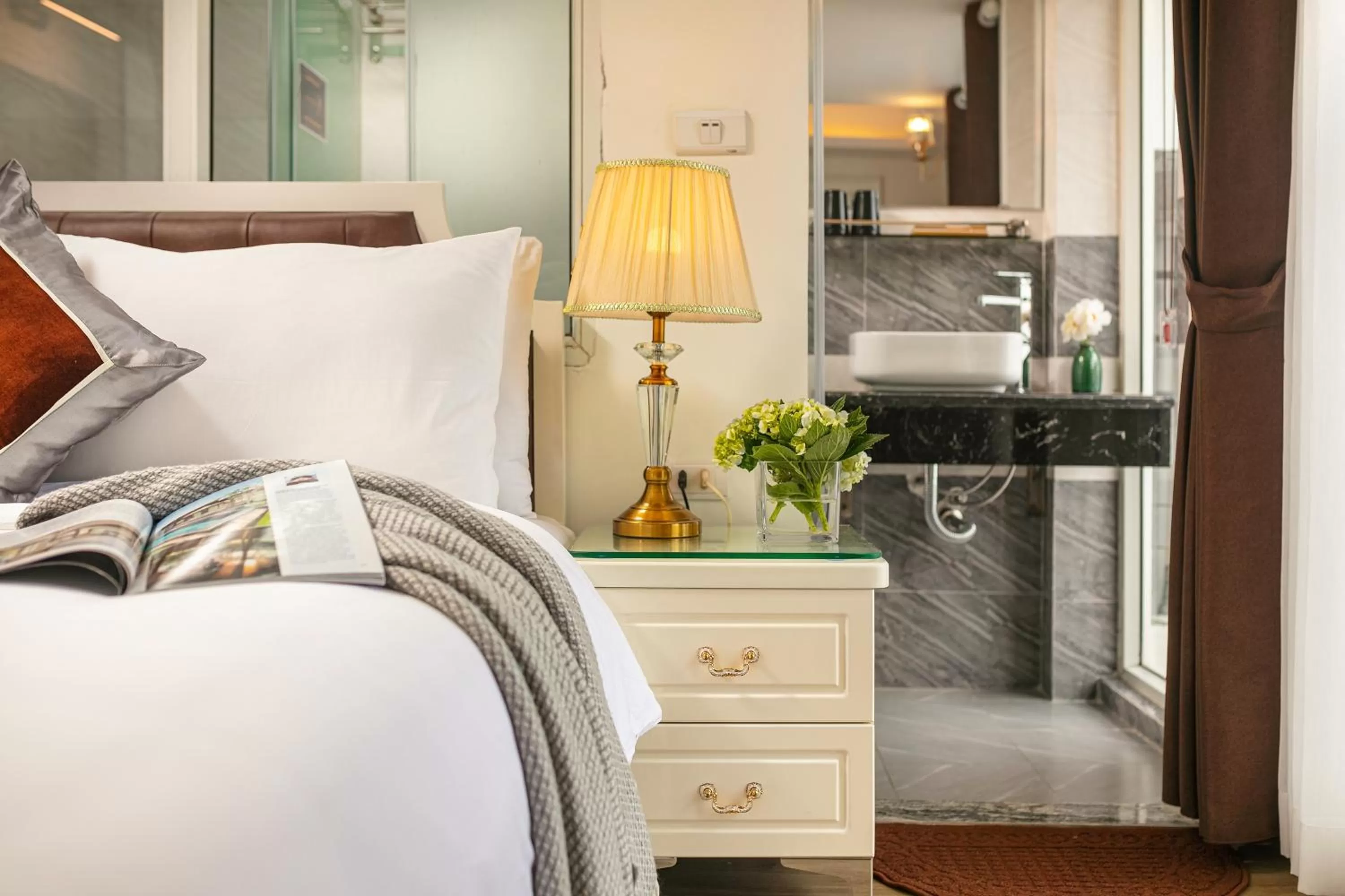 Bed in Tunger Grand Hotel